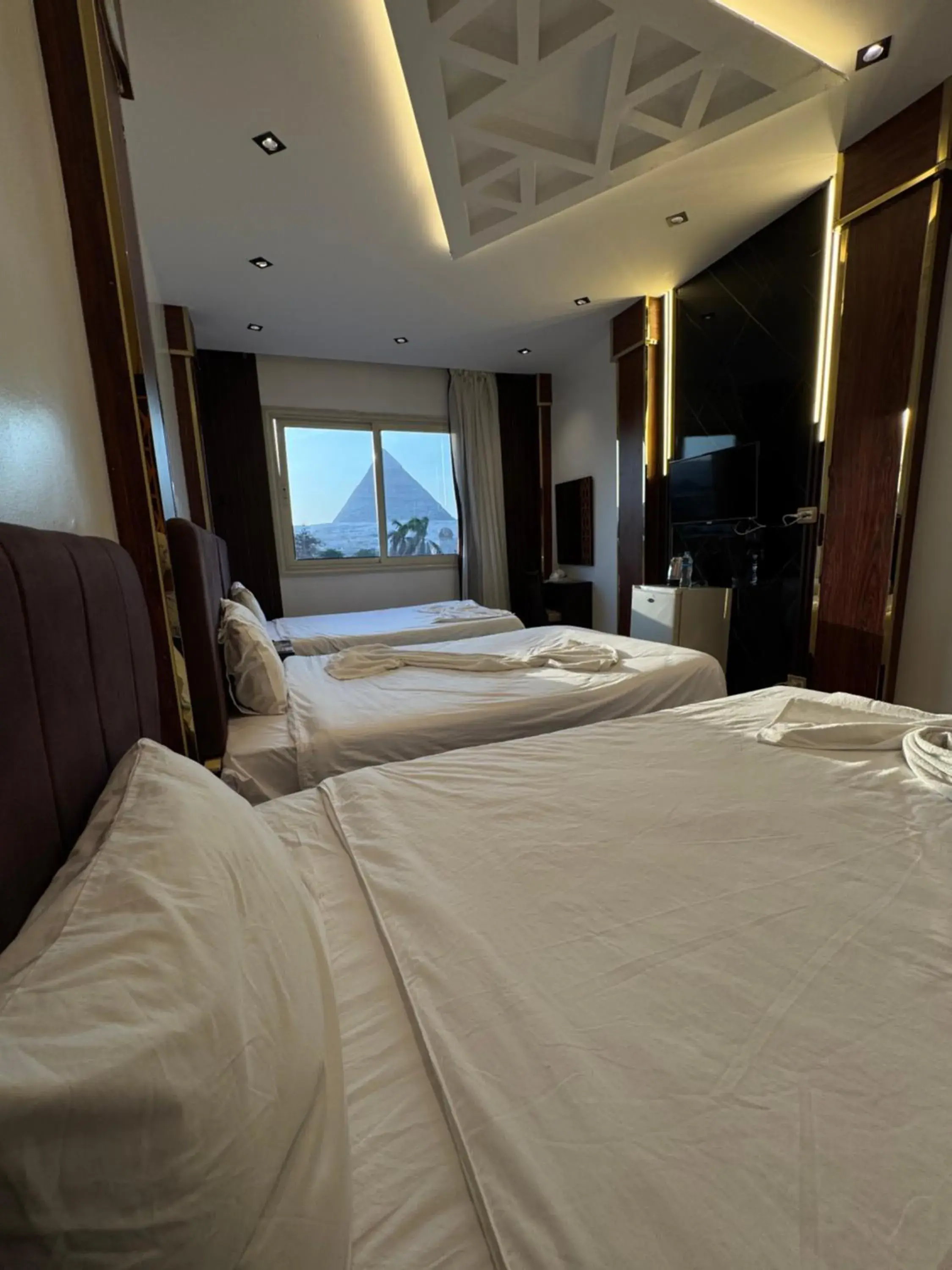 Triple Room with Window and Pyramids View - single occupancy in Sahara Pyramids Inn Triple Room with Window and Pyramids View - single occupancy in Sahara Pyramids Inn