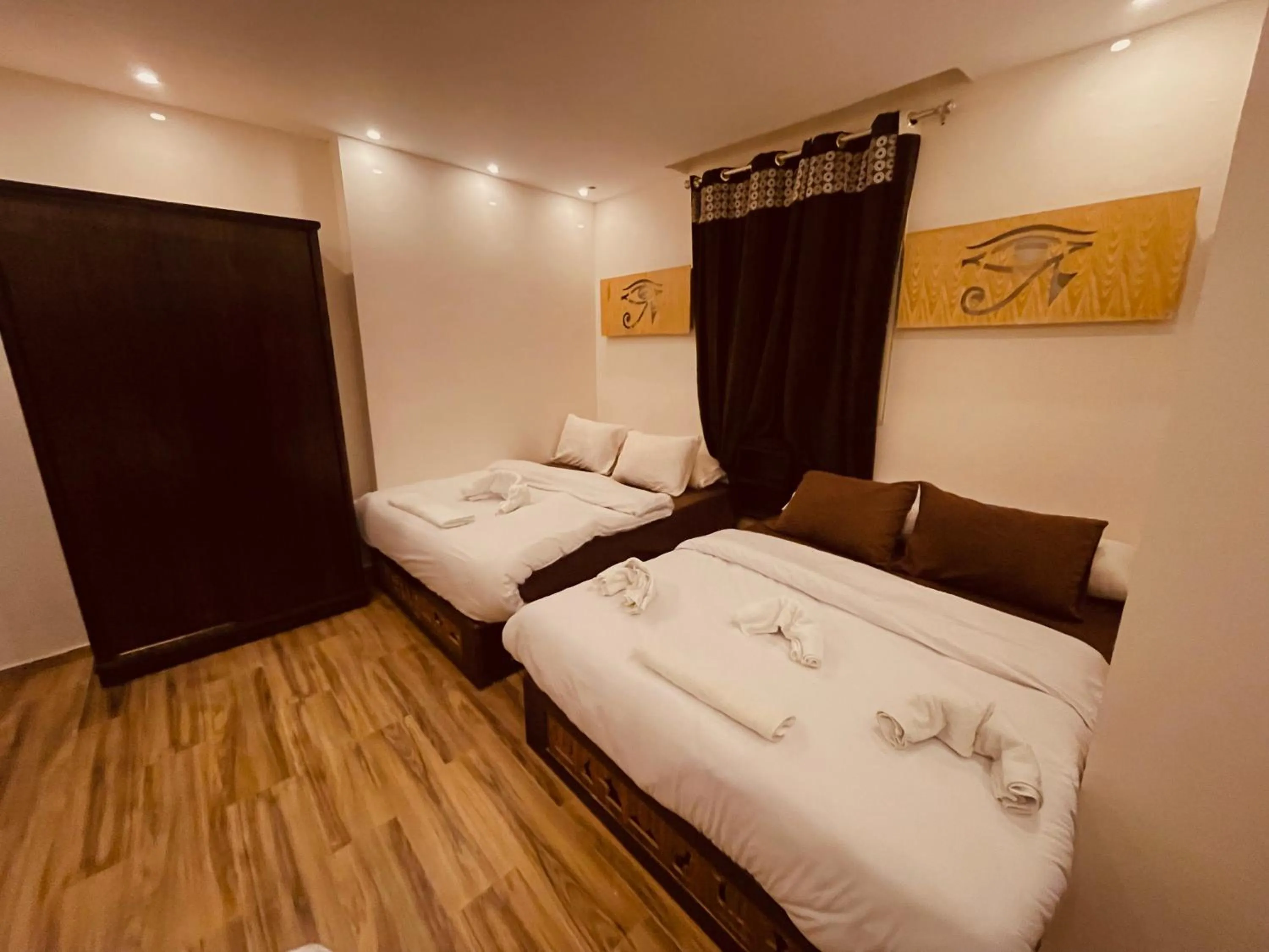 Bed in Sahara Pyramids Inn