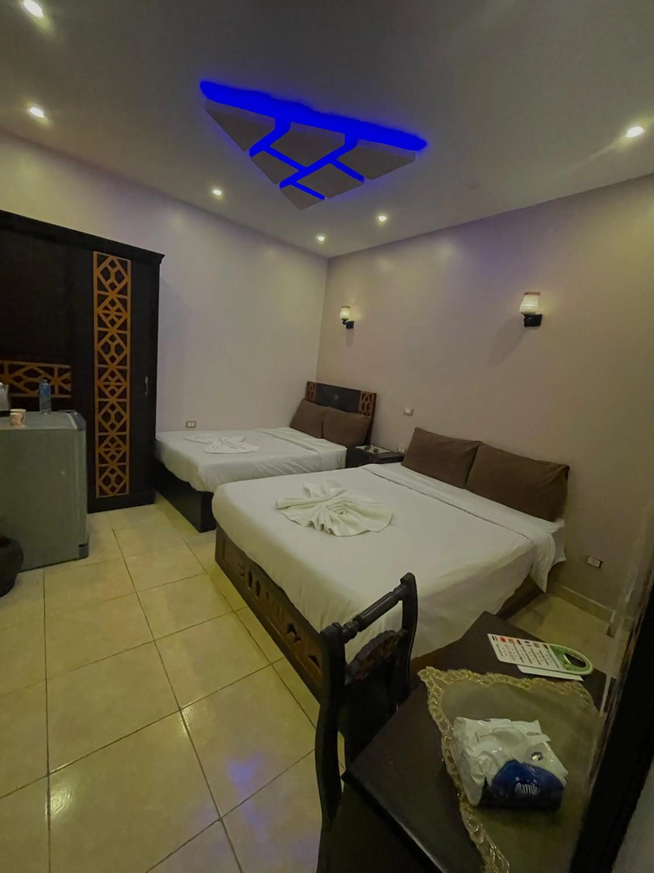 Bed in Sahara Pyramids Inn