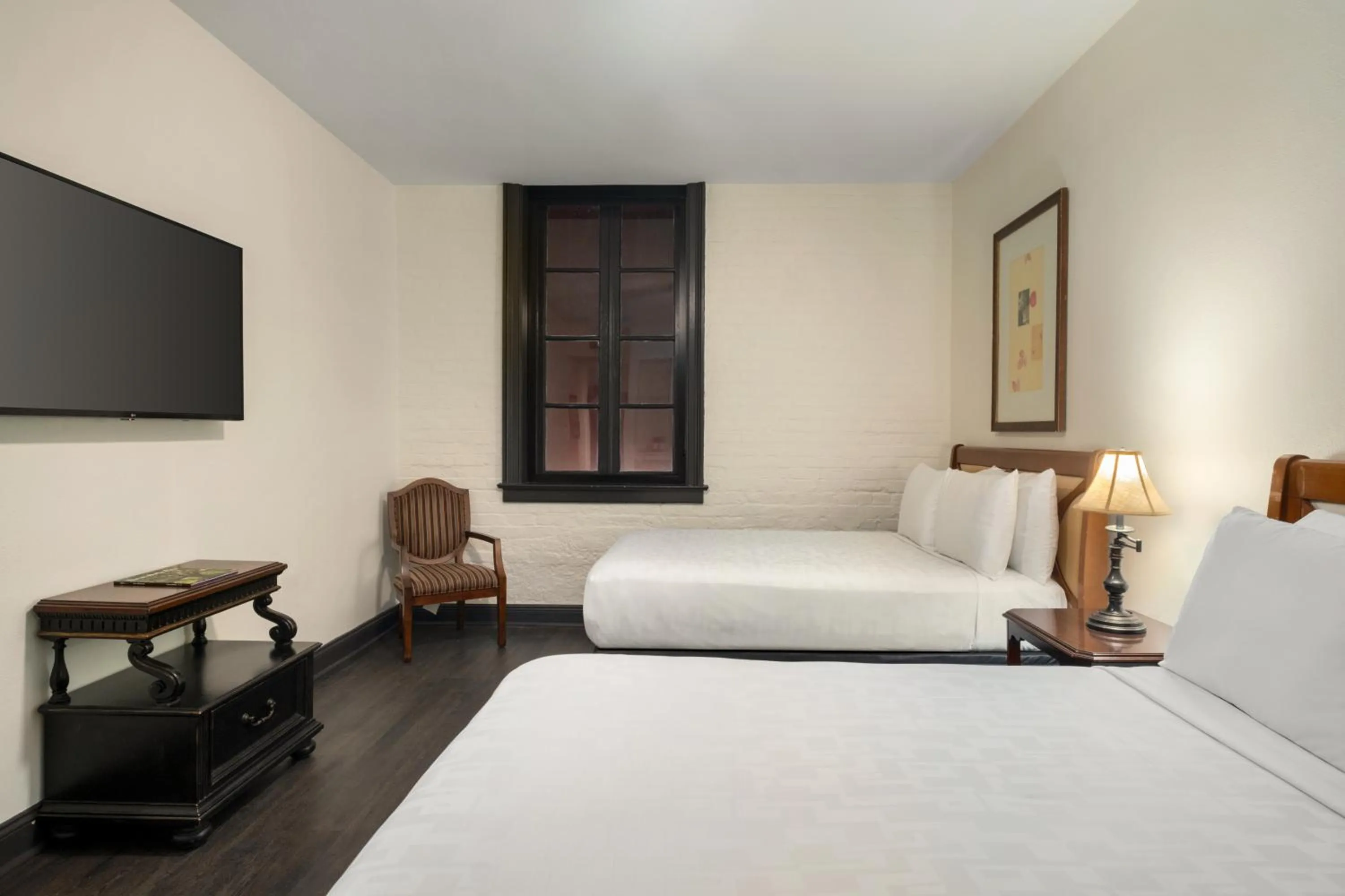 Bed in Le Richelieu Hotel in the French Quarter