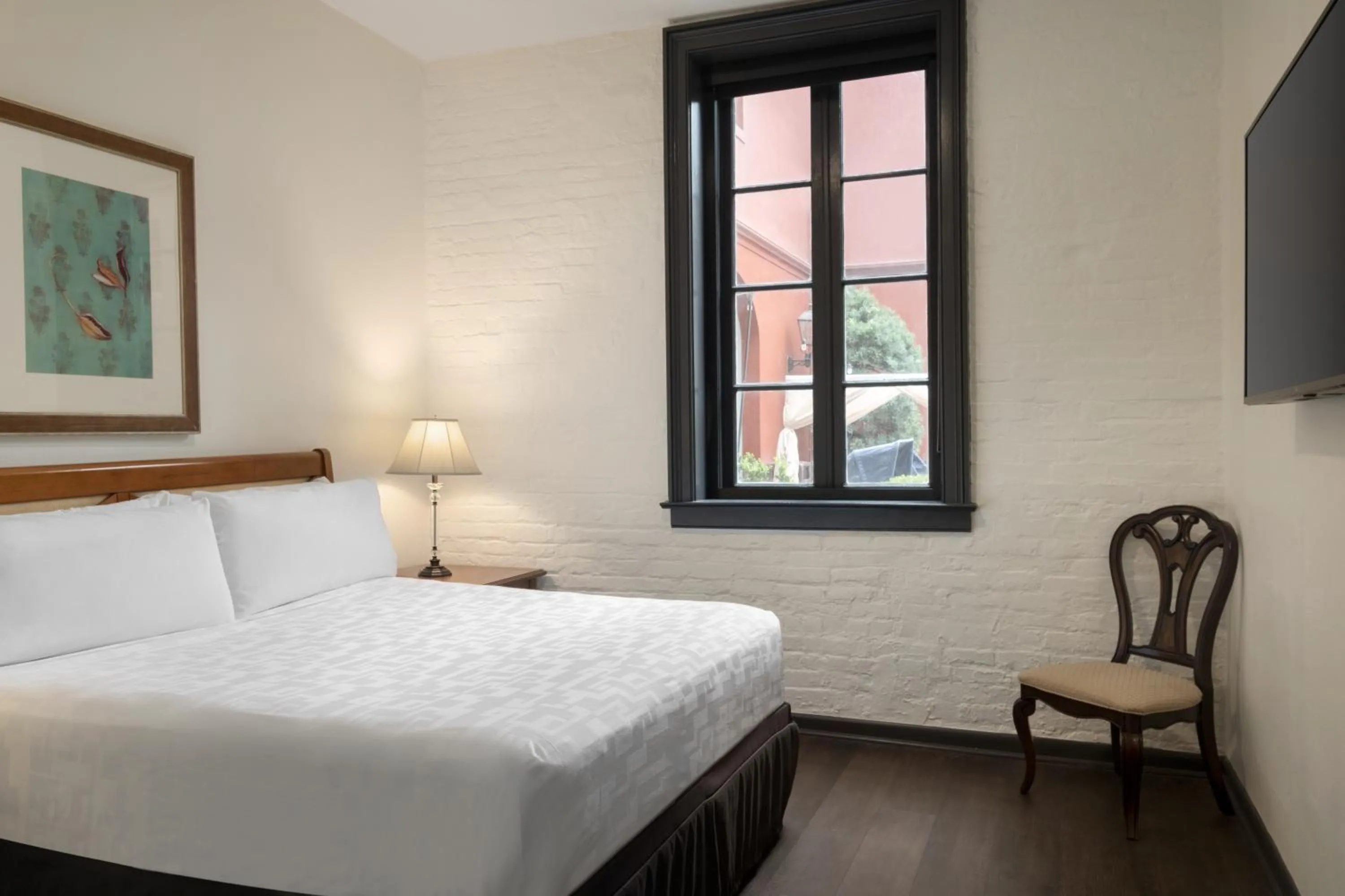 Bed in Le Richelieu Hotel in the French Quarter