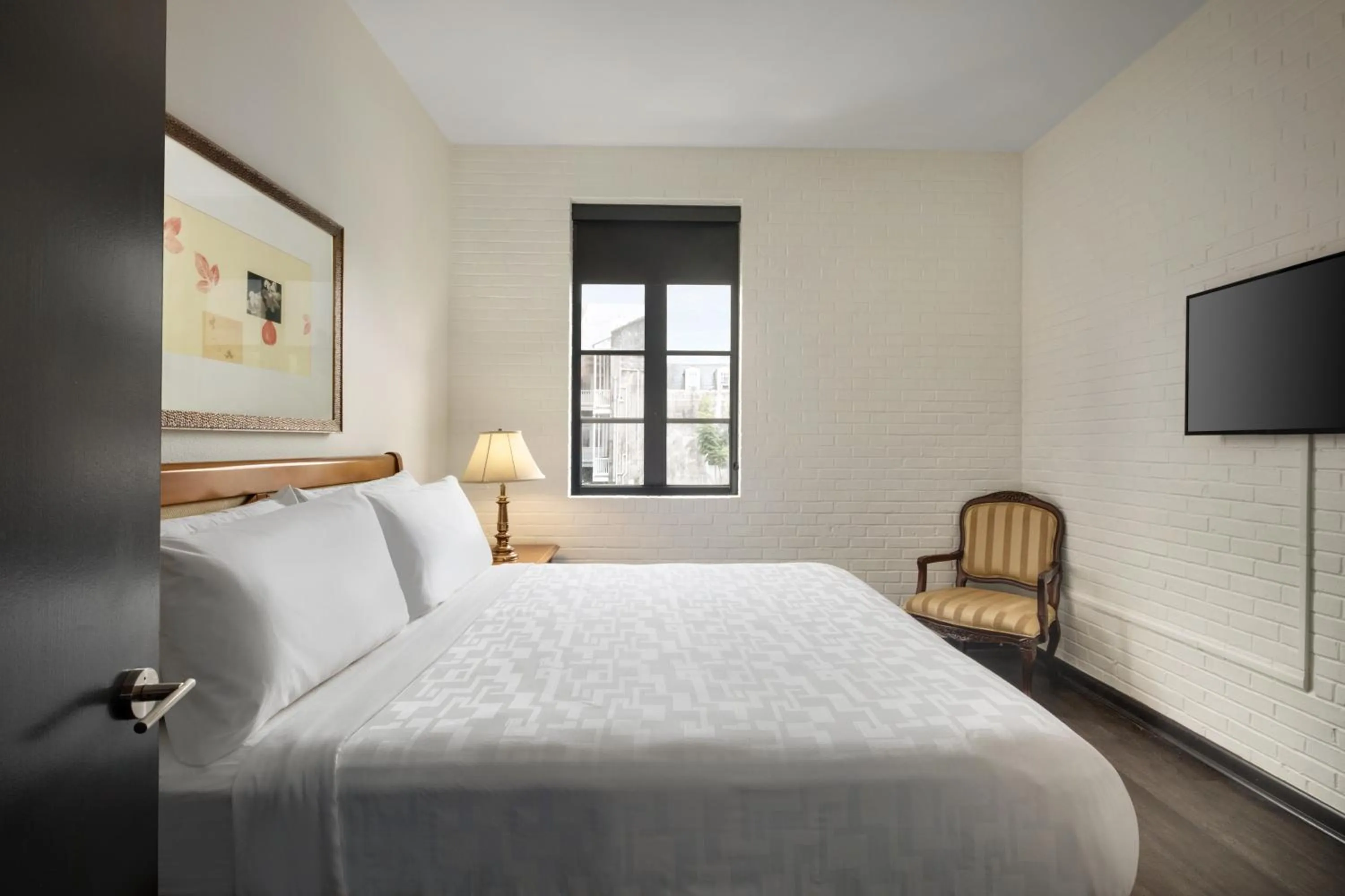 Bed in Le Richelieu Hotel in the French Quarter