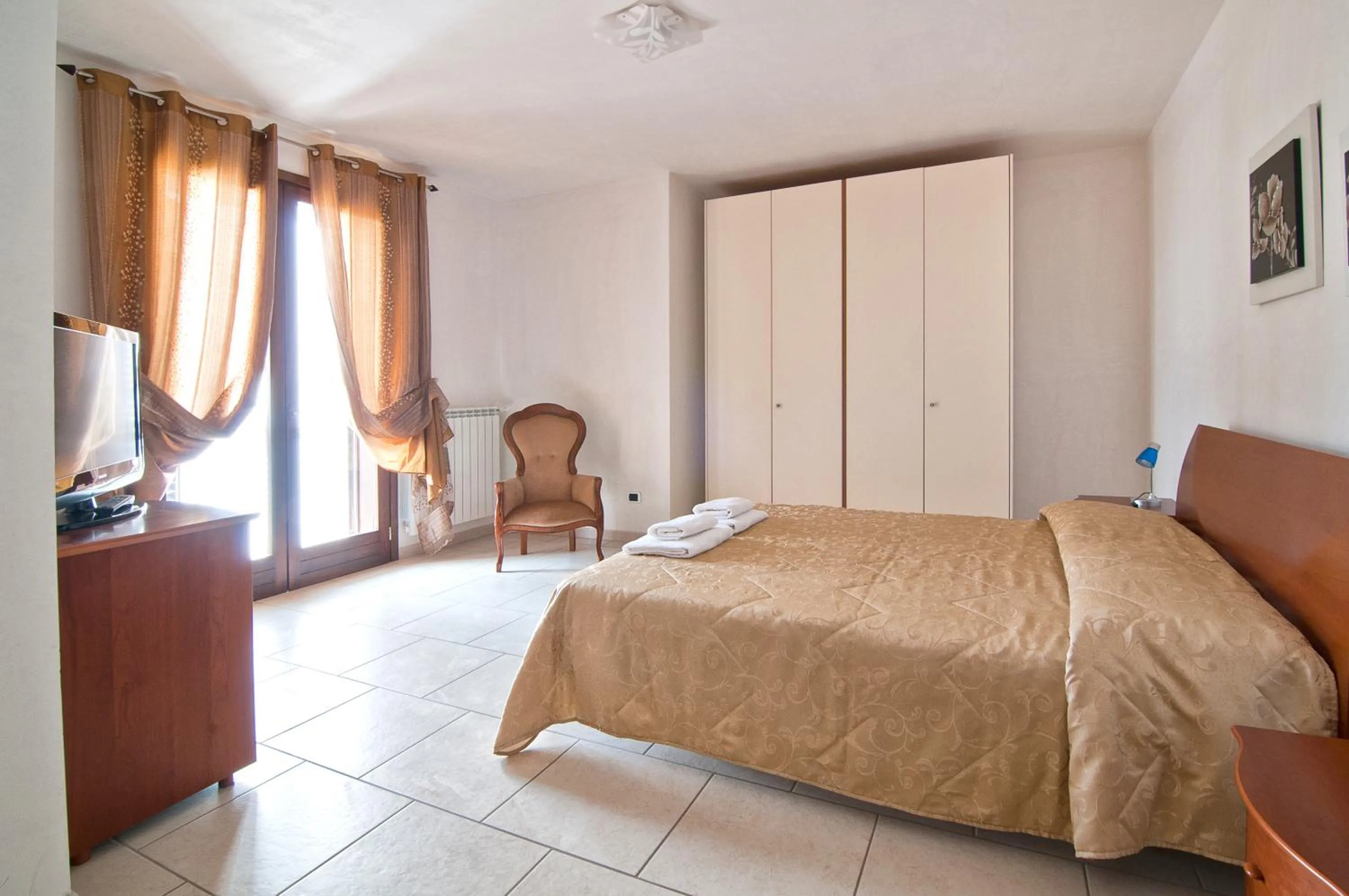 Day, Bed in Giardino Dei Suoni B&B