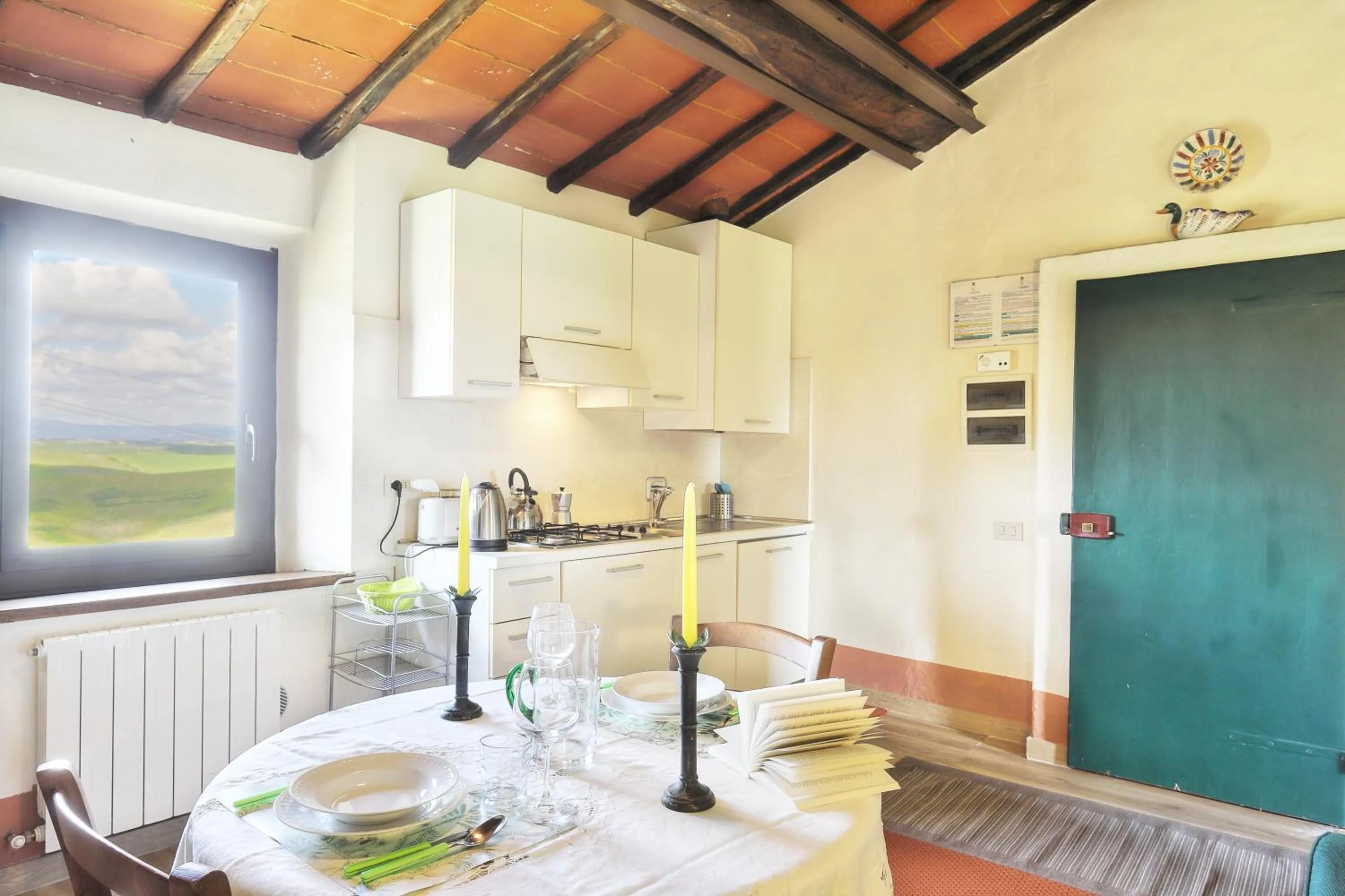 Kitchen or kitchenette in Appartamenti Villa e Fattoria di Radi Tuscany