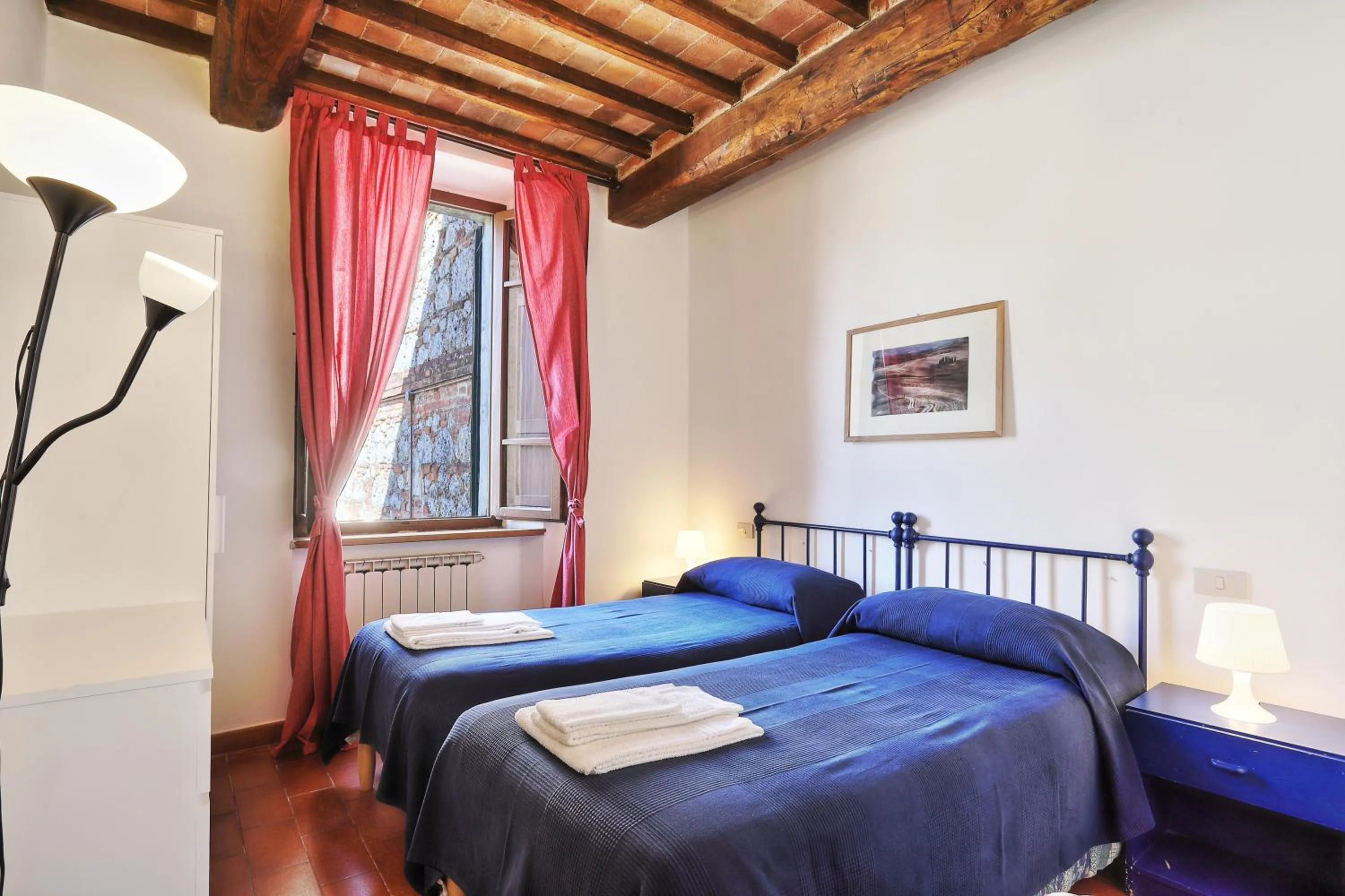 Bedroom, Bed in Appartamenti Villa e Fattoria di Radi Tuscany