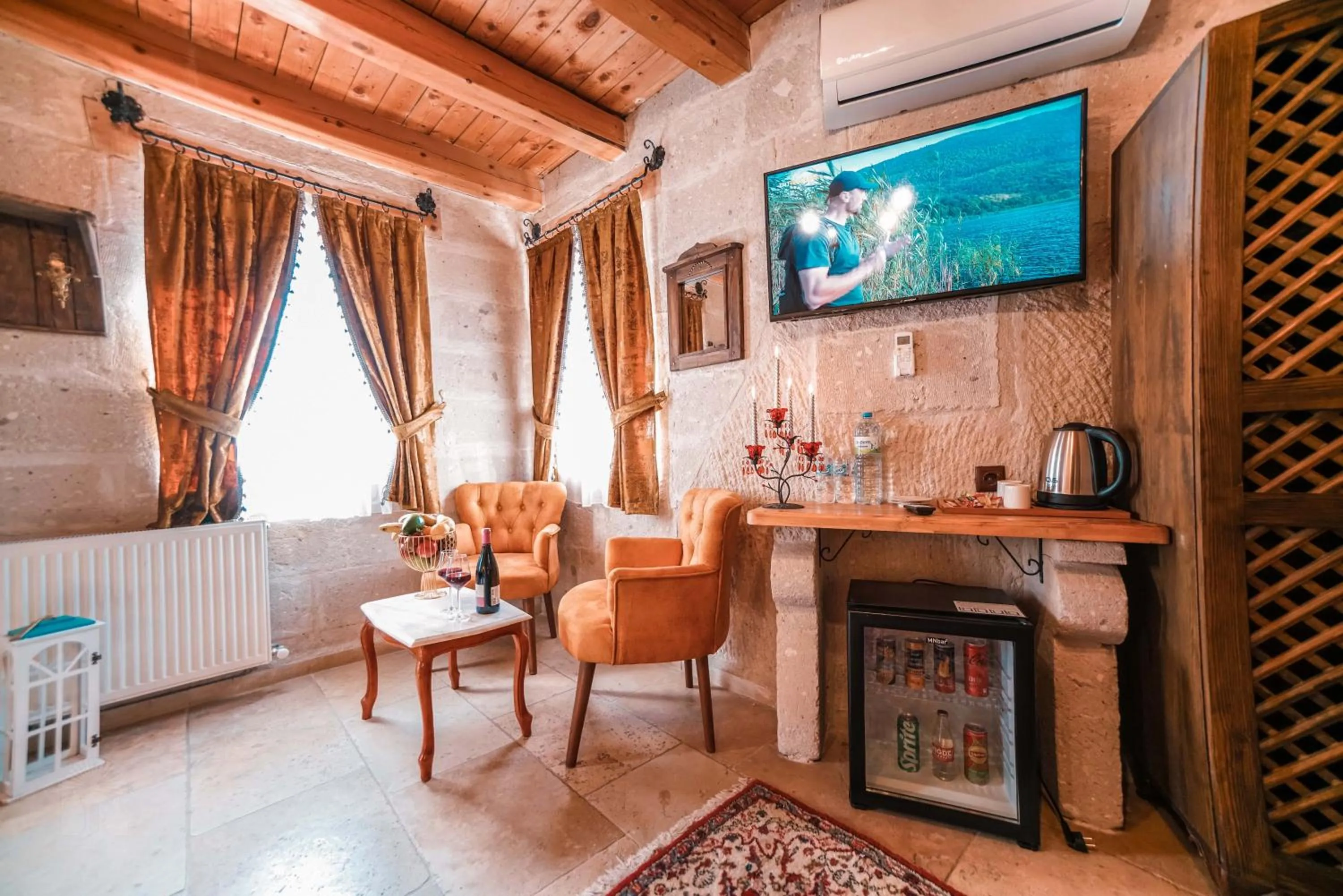 Seating area in Zeus Cave Suites