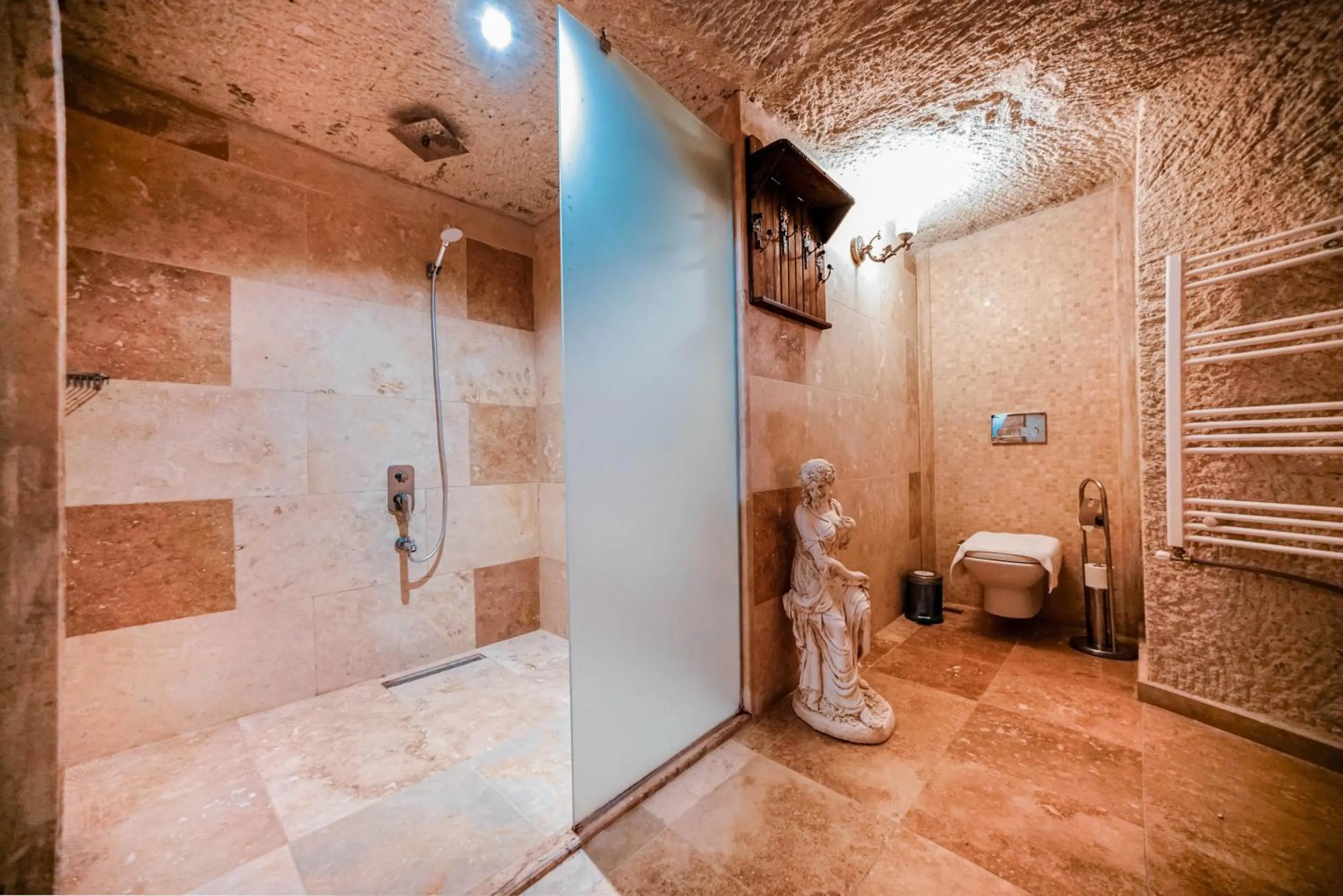 Shower in Zeus Cave Suites