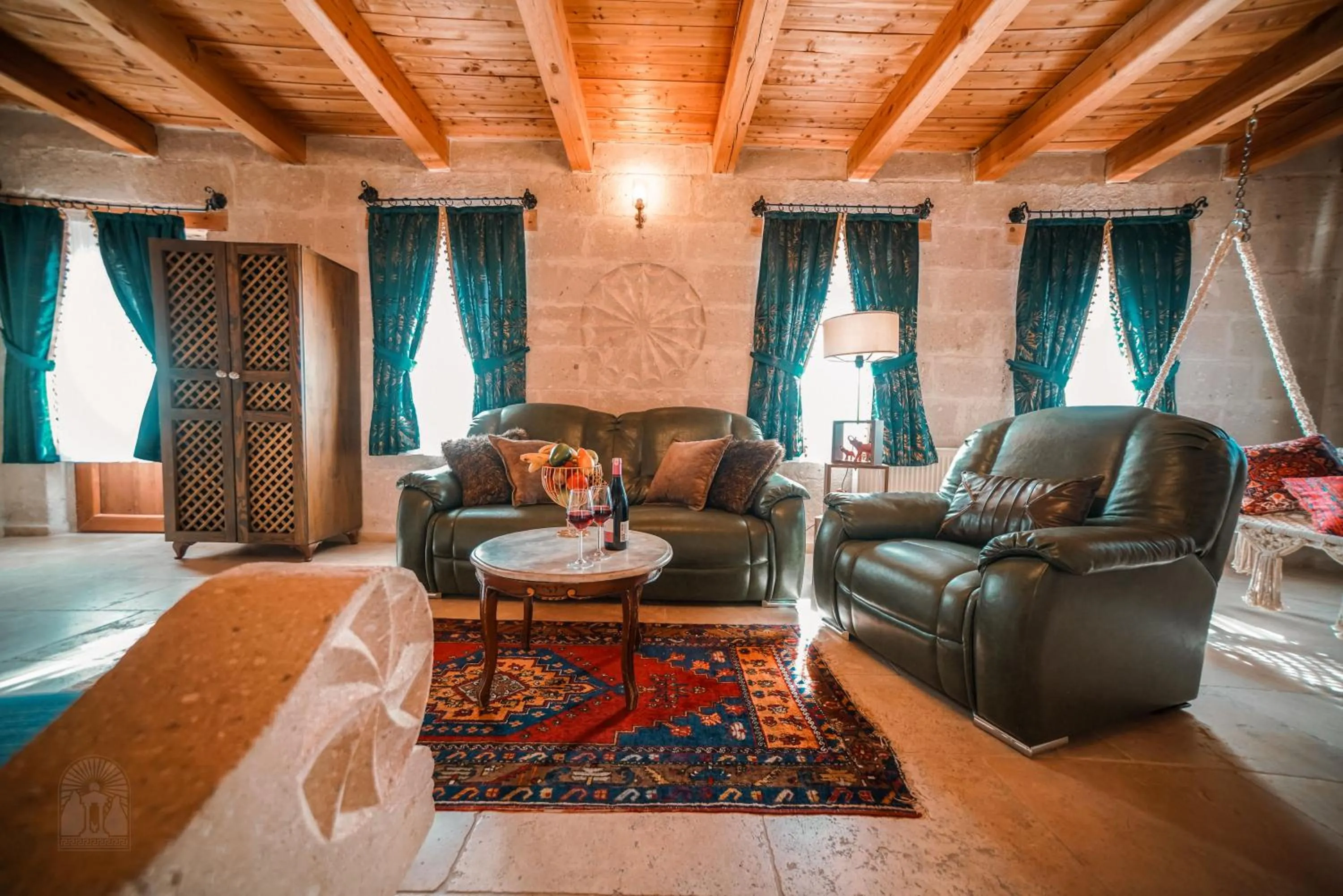 Seating area in Zeus Cave Suites