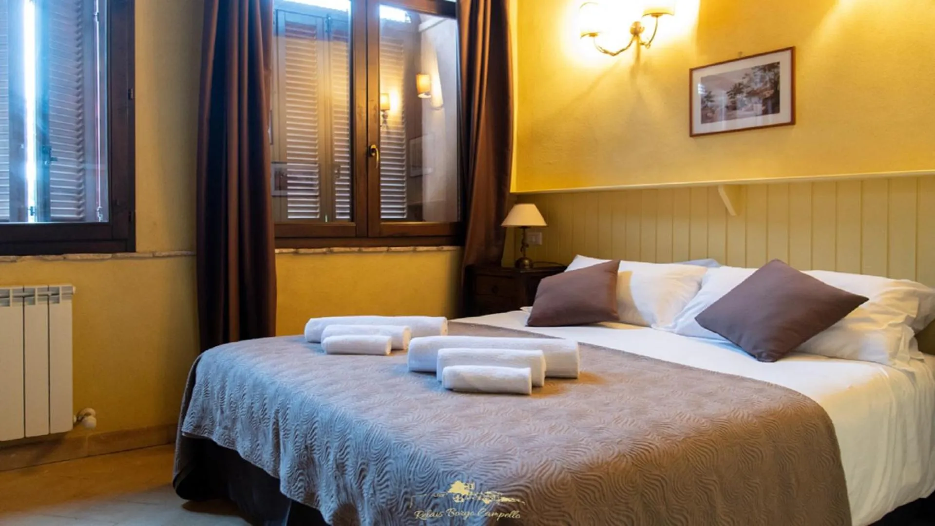 Bed in Relais Borgo Campello