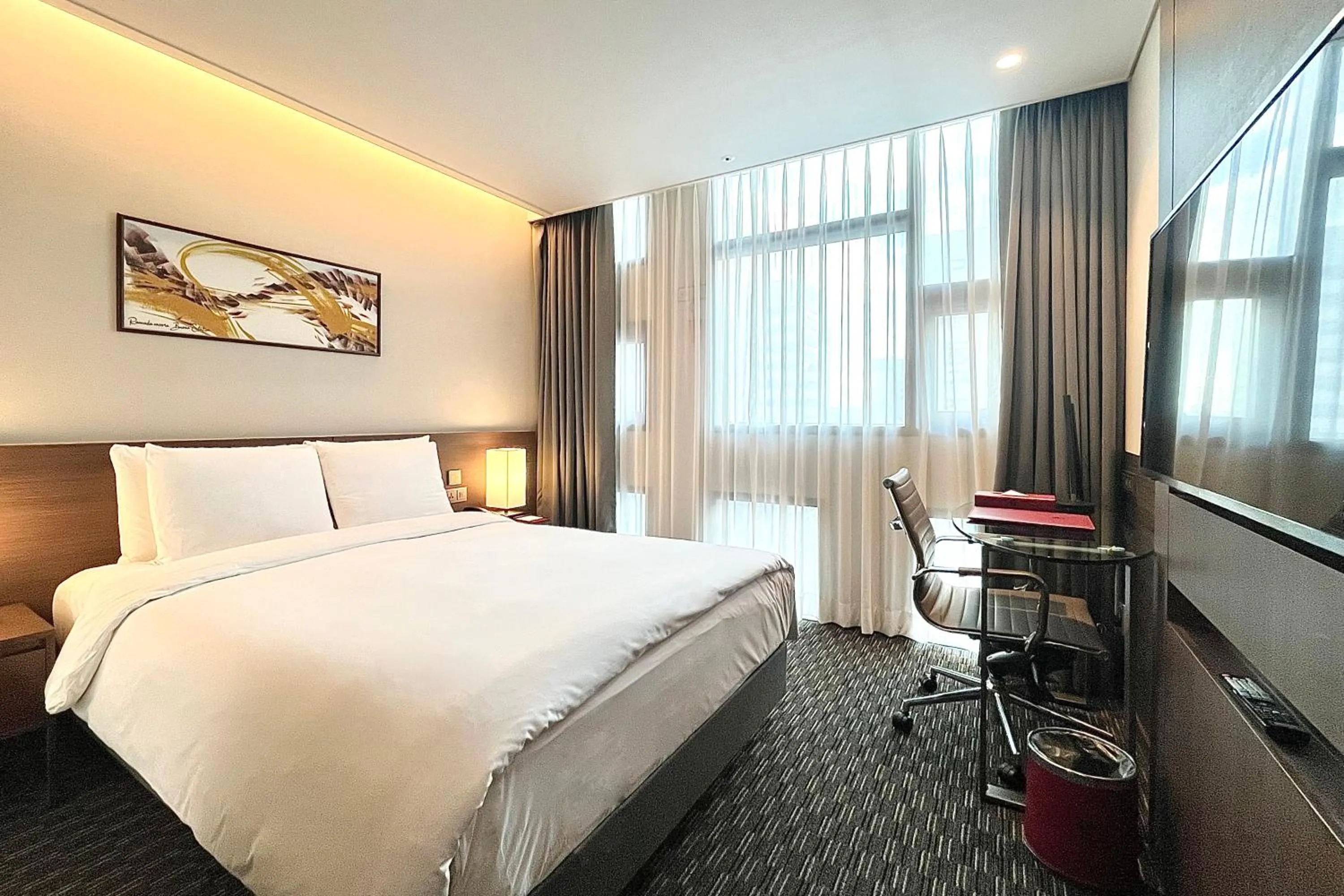 Bed in Ramada Encore by Wyndham Busan Station