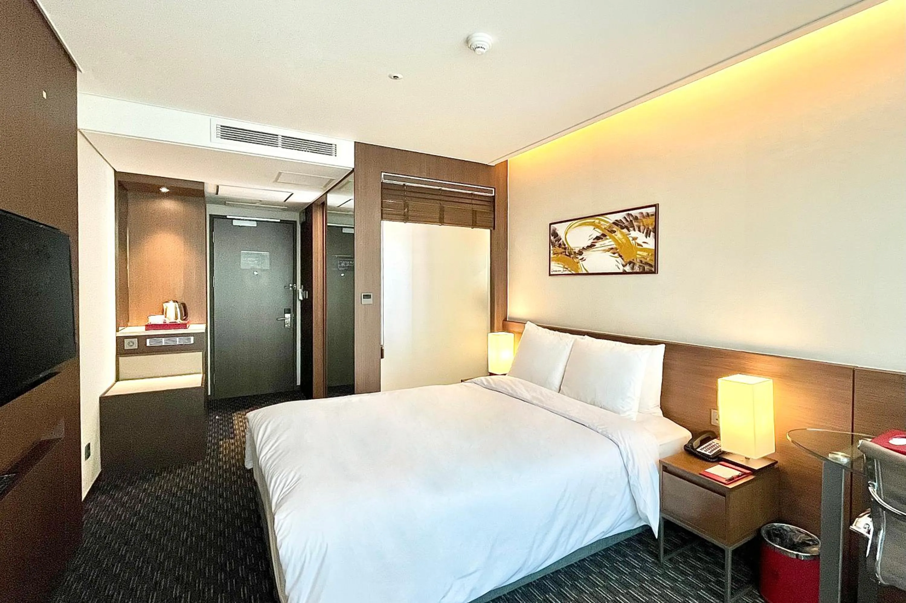 Bed in Ramada Encore by Wyndham Busan Station