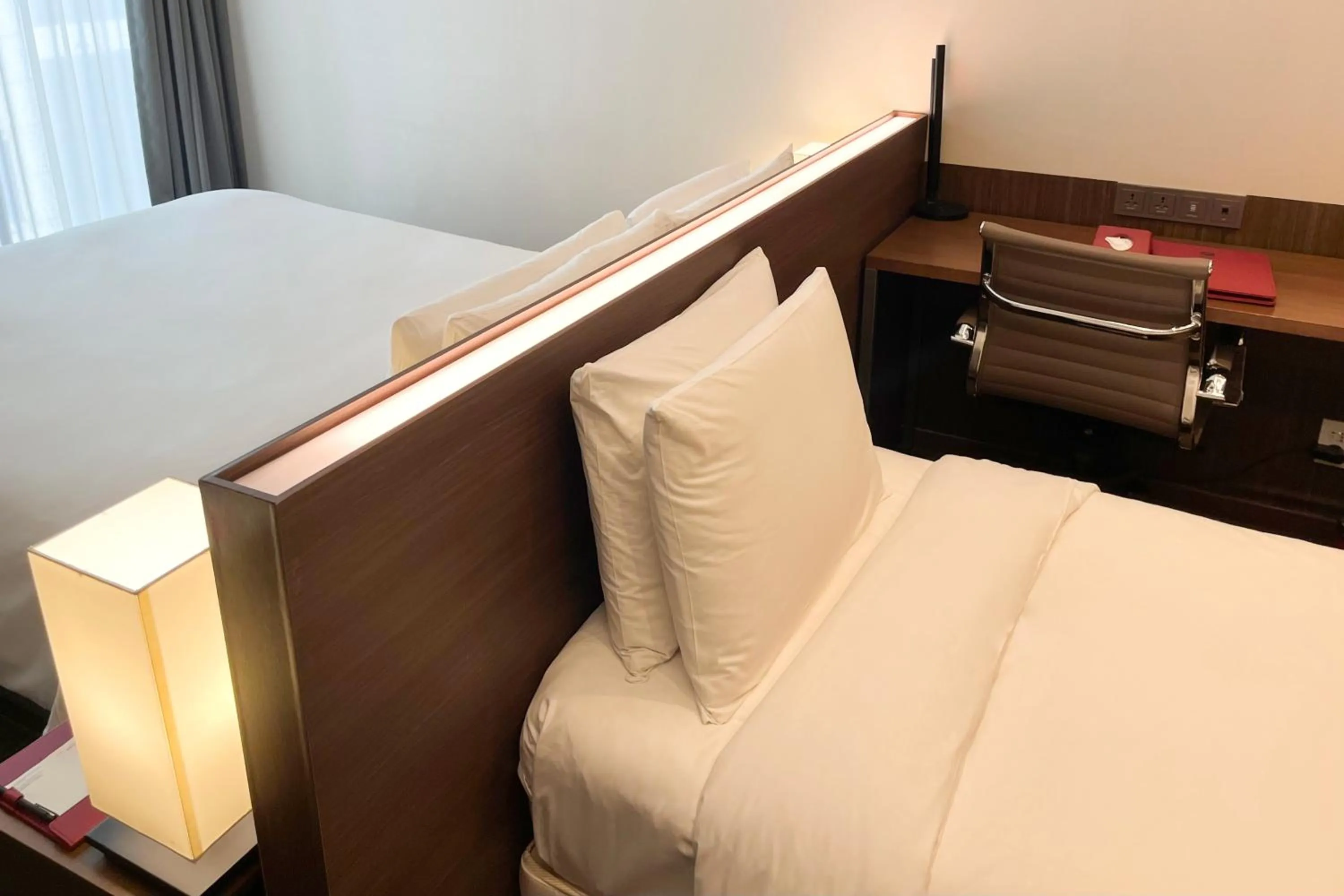 Bed in Ramada Encore by Wyndham Busan Station