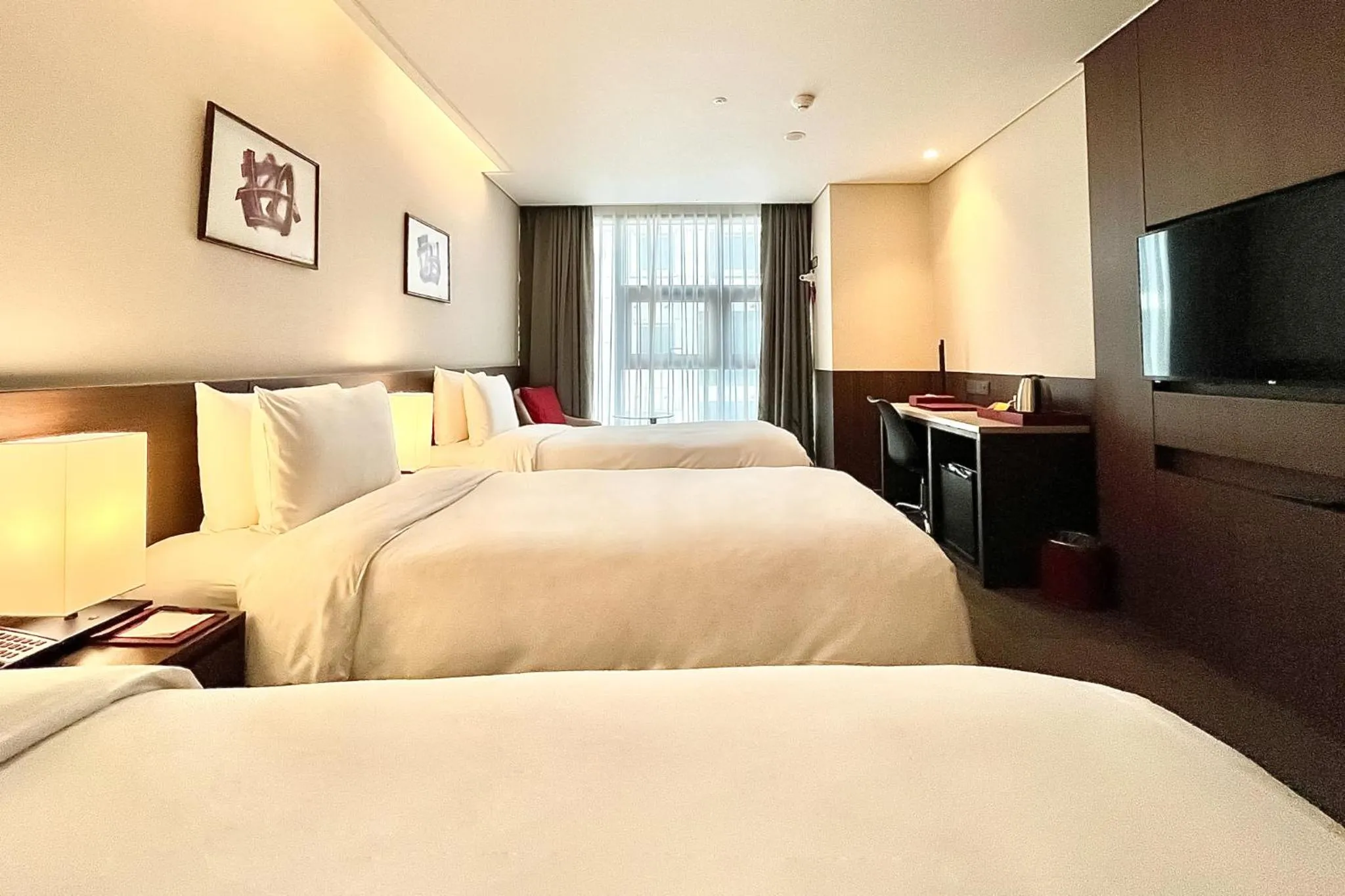 Bed in Ramada Encore by Wyndham Busan Station
