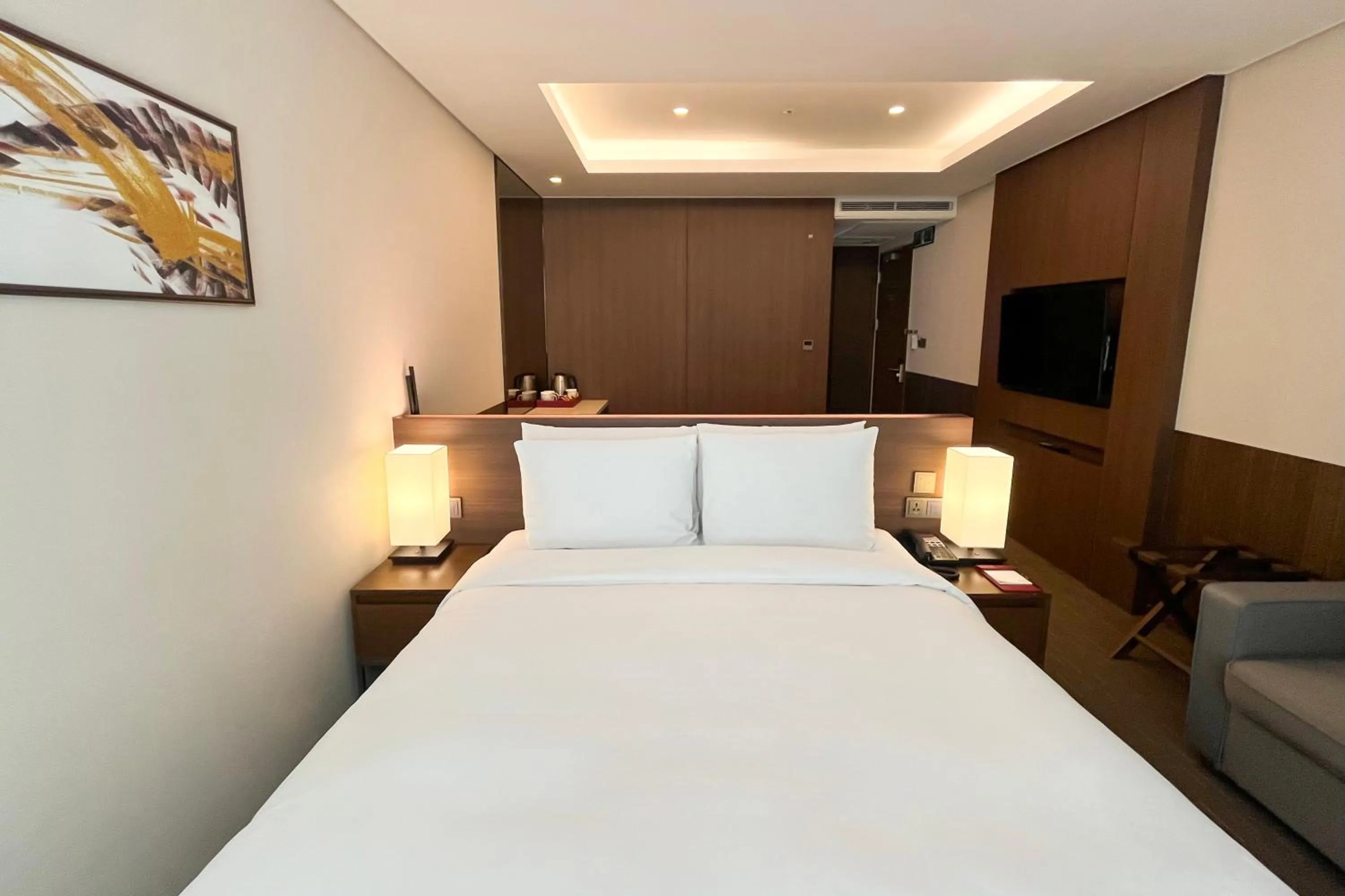 Bed in Ramada Encore by Wyndham Busan Station