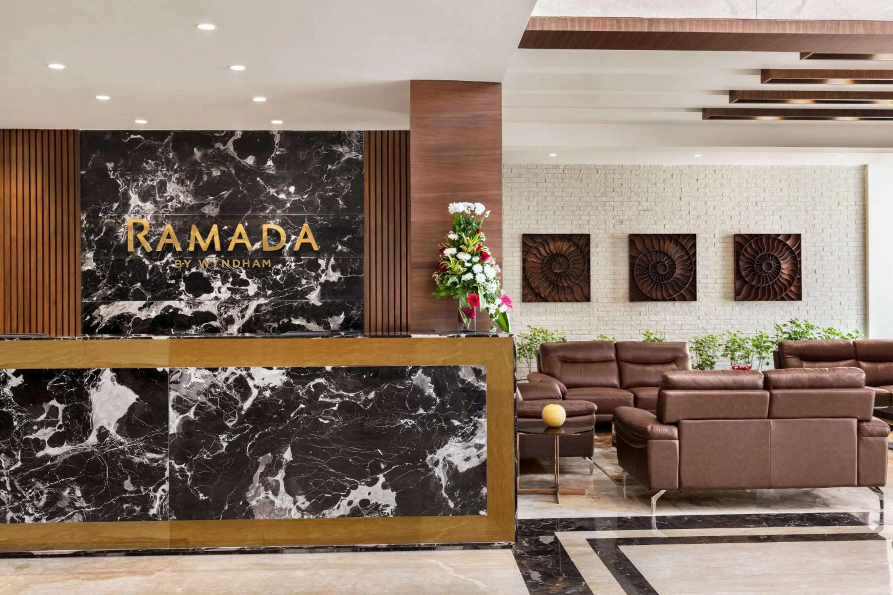 Lobby or reception in Ramada by Wyndham Gandhidham Shinay