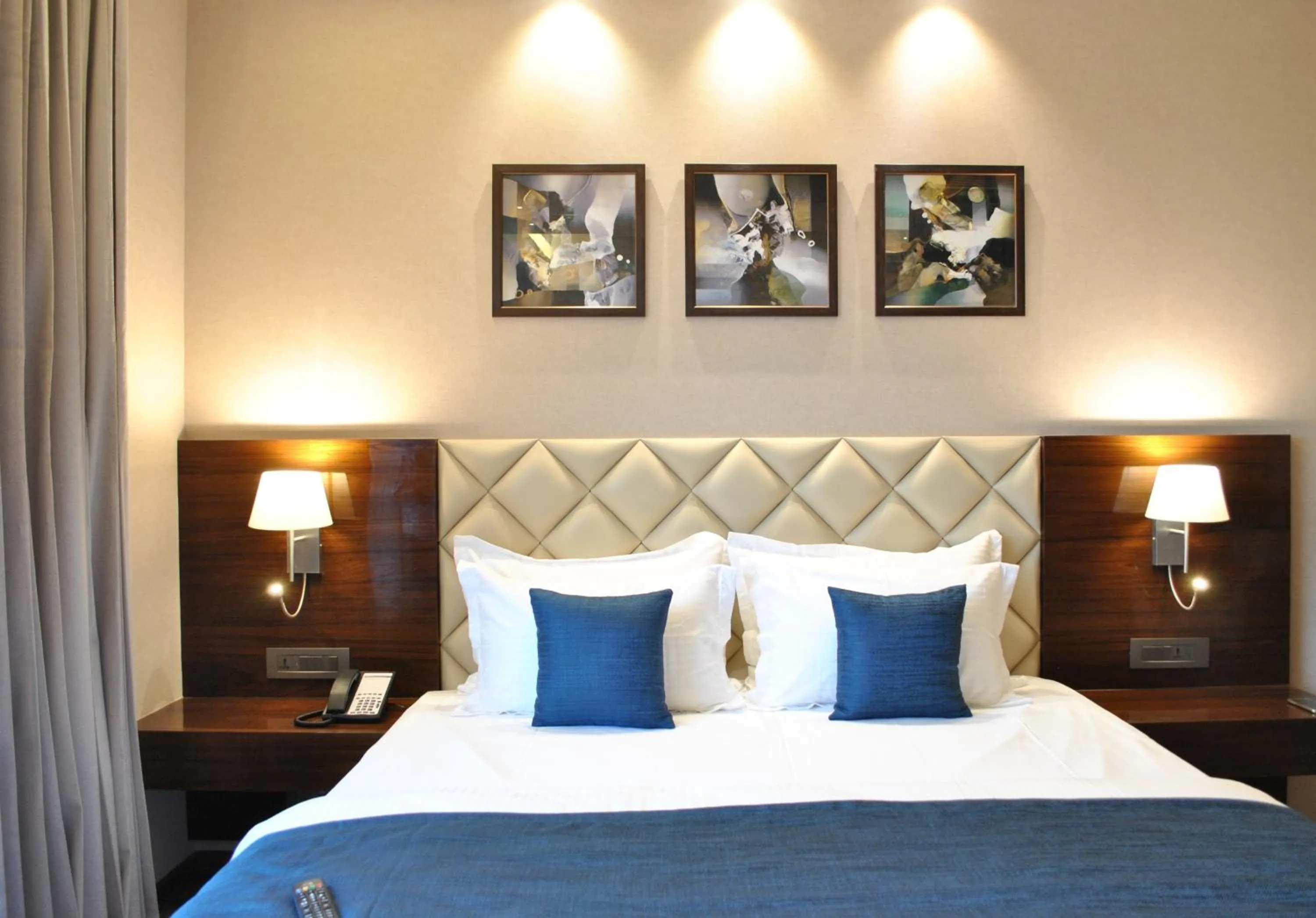 Bedroom, Bed in Ramada by Wyndham Gandhidham Shinay