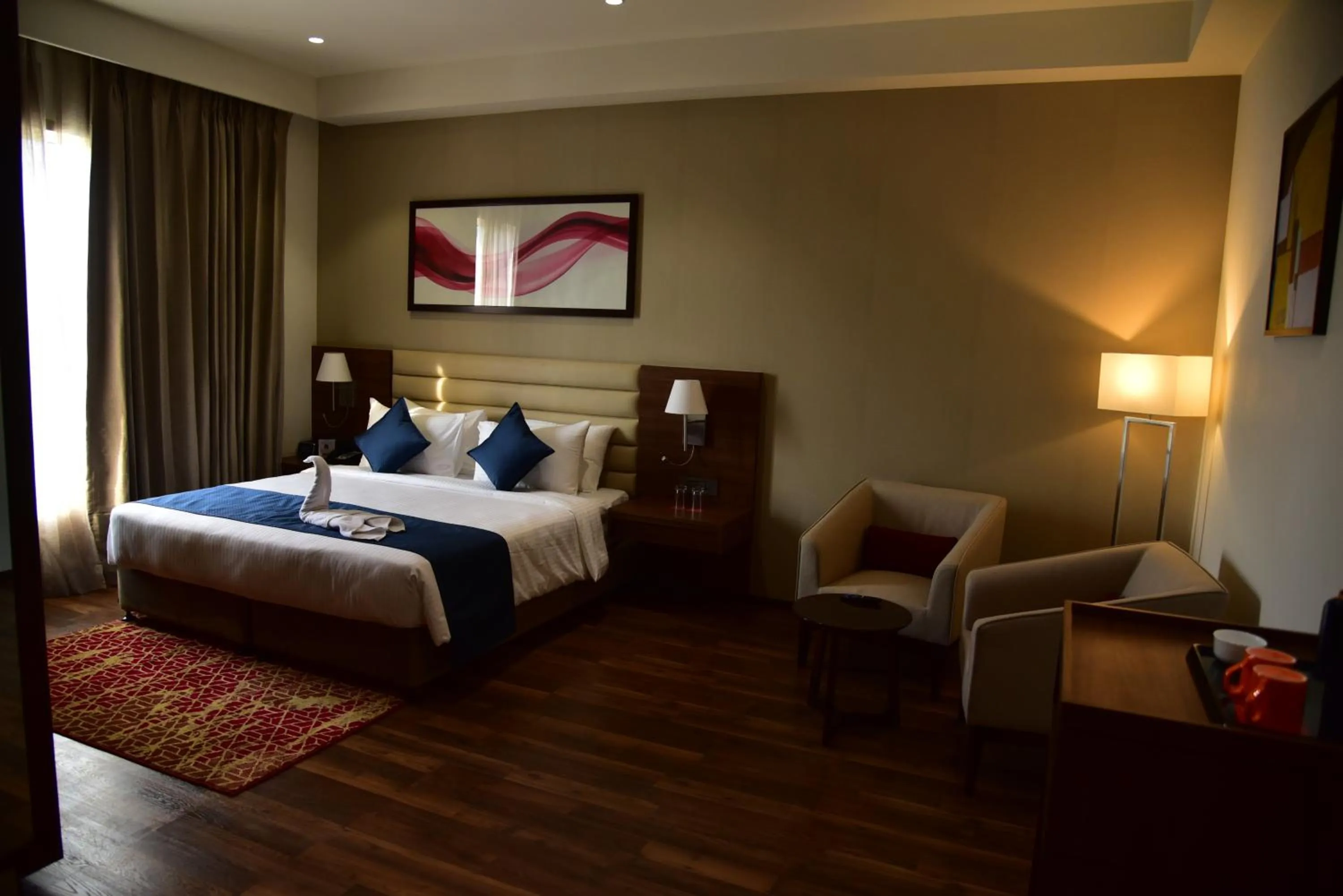 Bedroom, Bed in Ramada by Wyndham Gandhidham Shinay