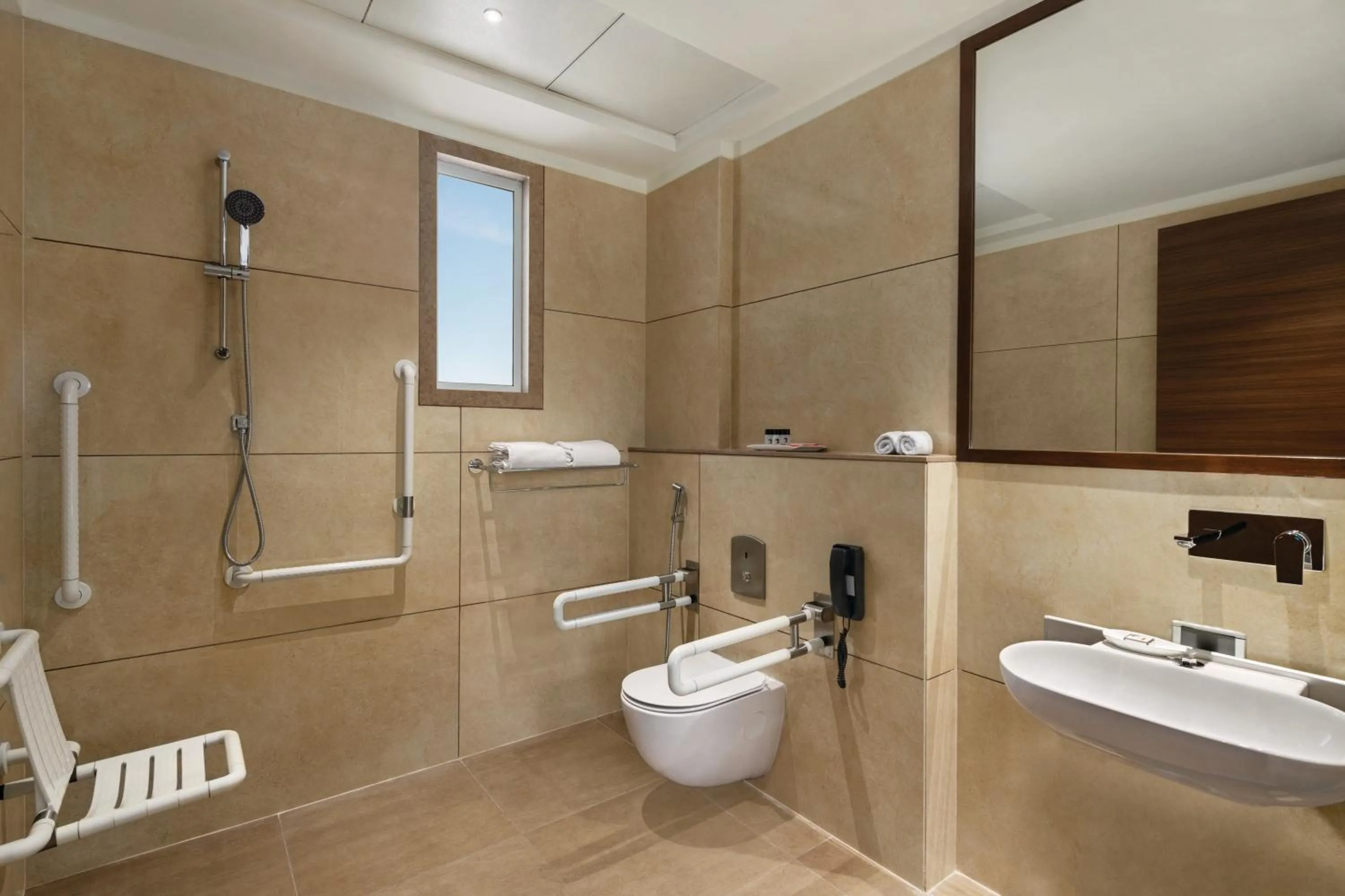 Bathroom in Ramada by Wyndham Gandhidham Shinay