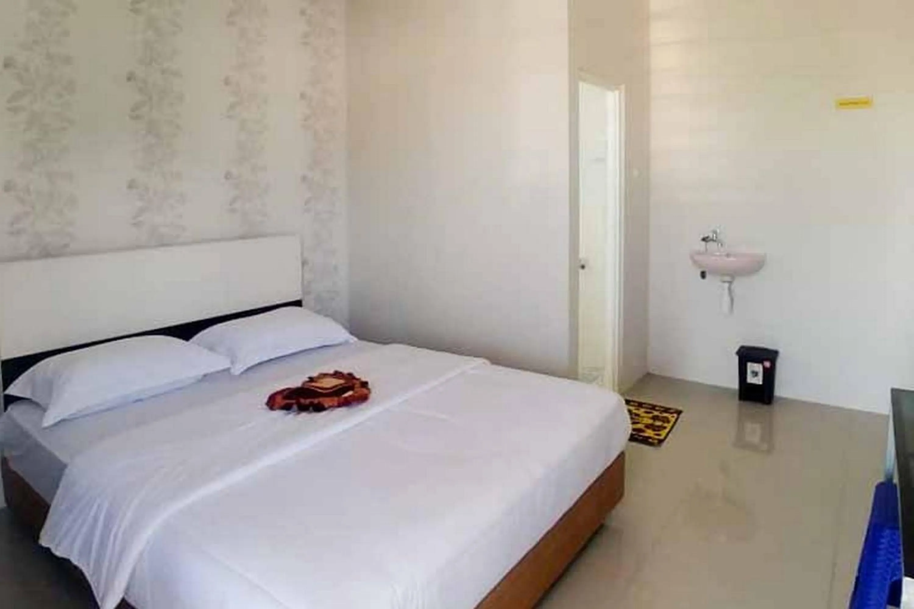 Bed in Griya Mulya near Alun Alun Batu Mitra RedDoorz