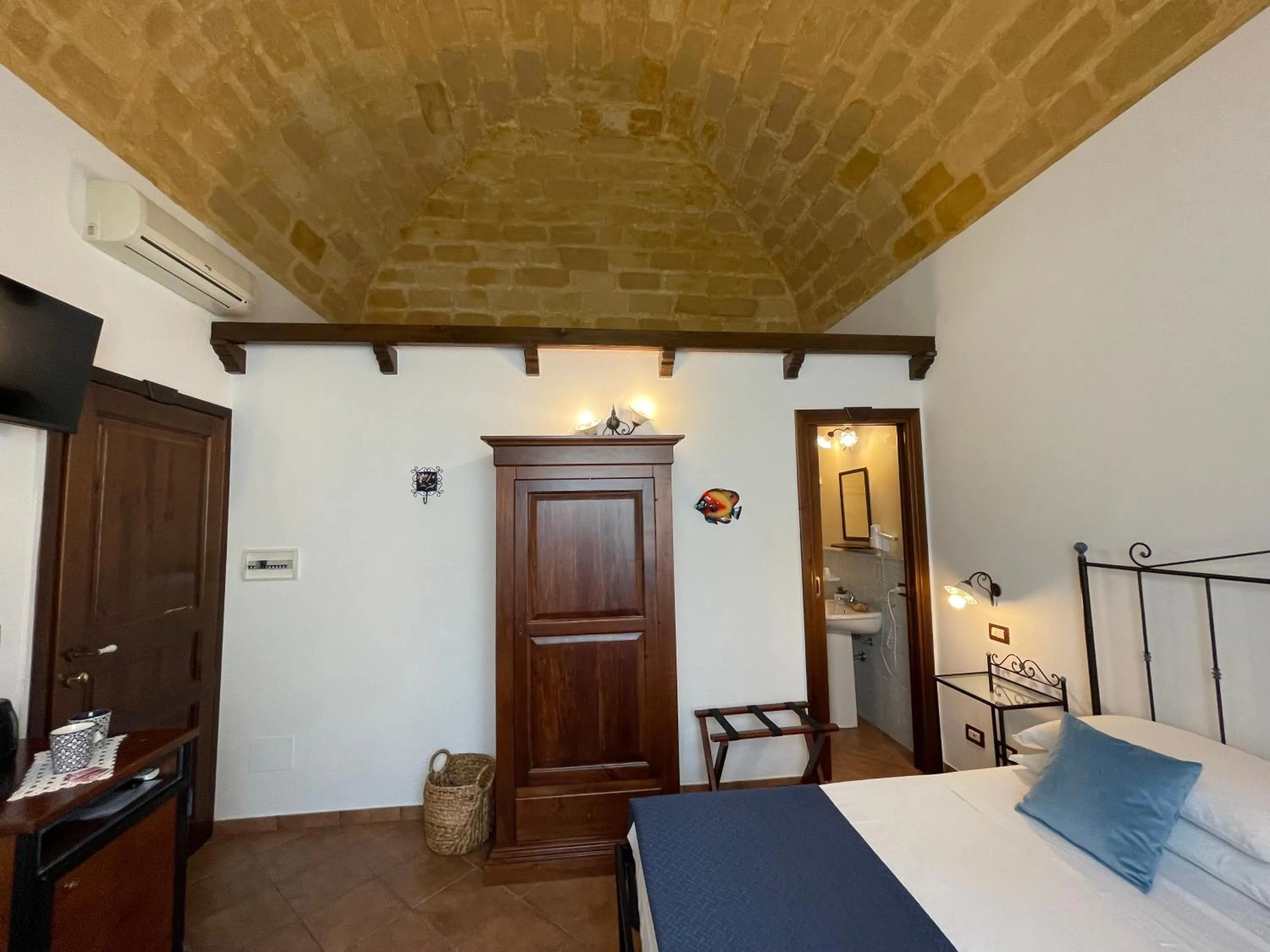 Bed in Ai Dammusi Rooms