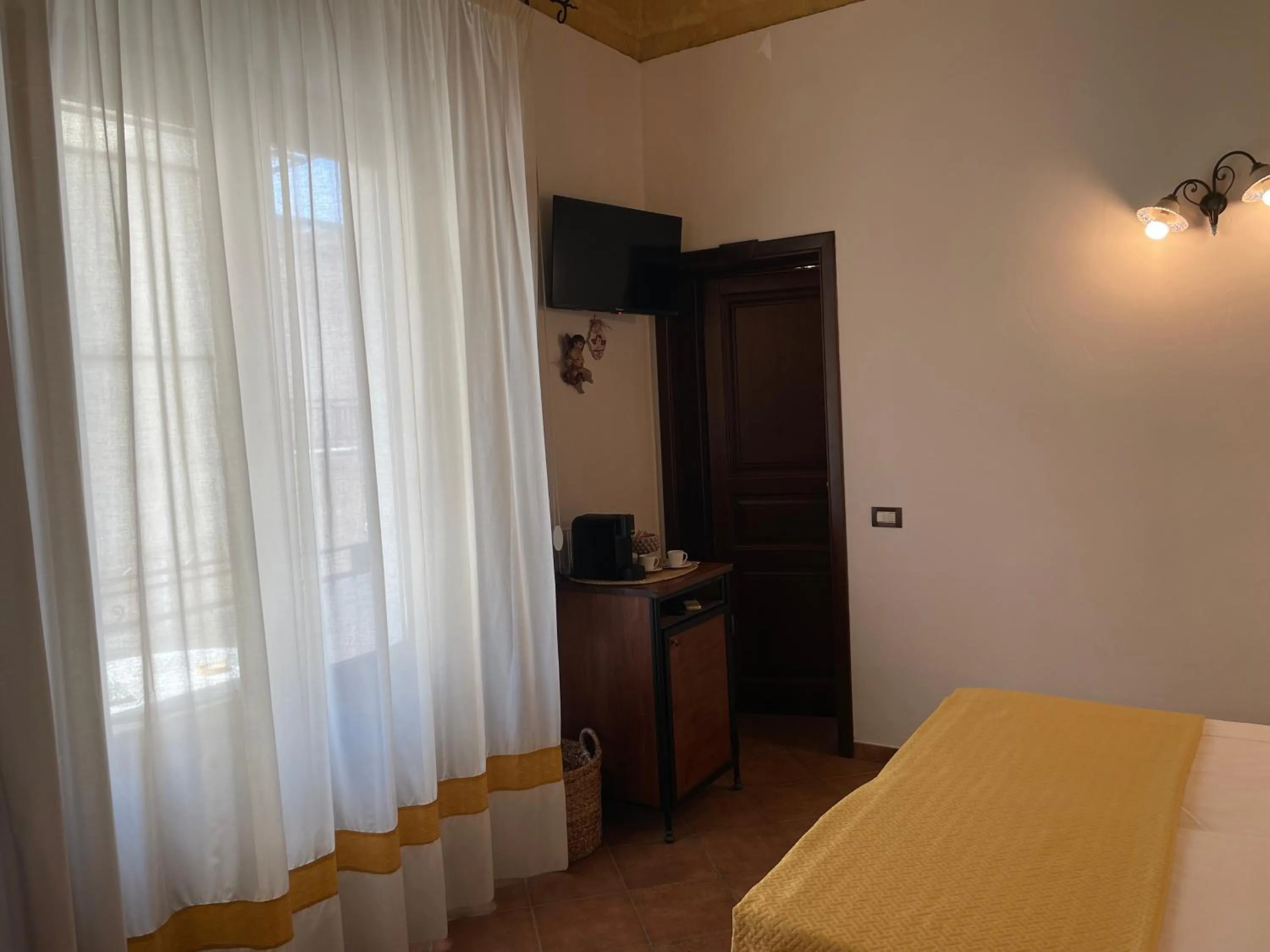 Bed in Ai Dammusi Rooms