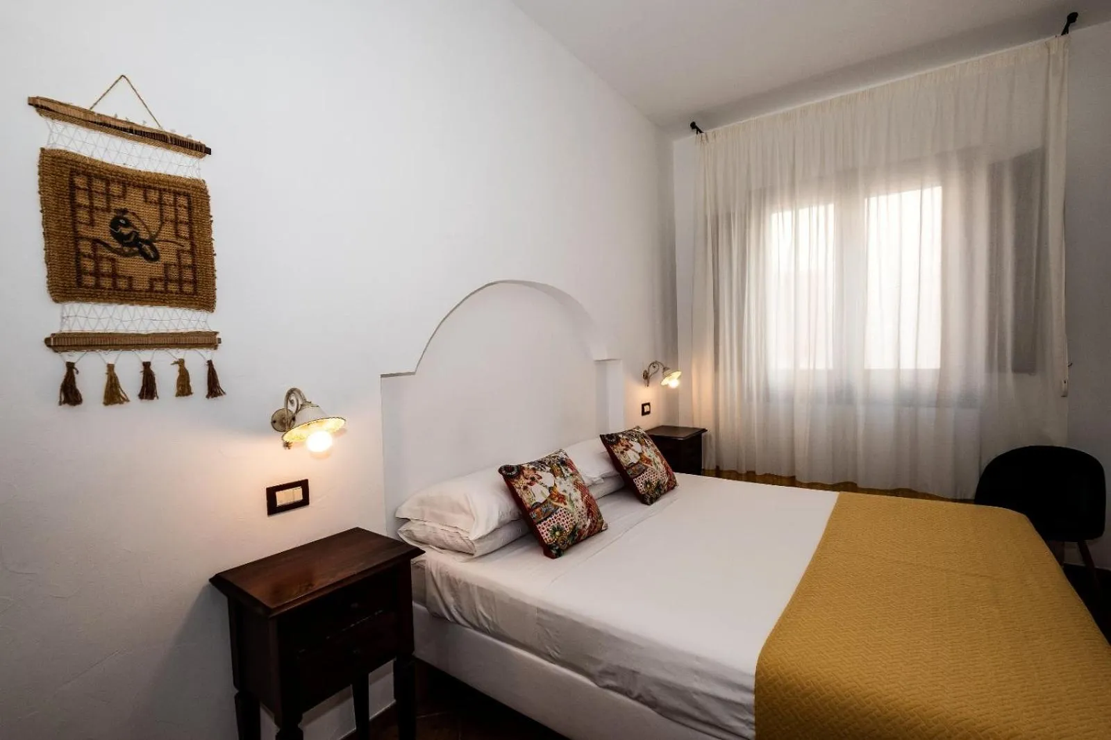 Bed in Ai Dammusi Rooms