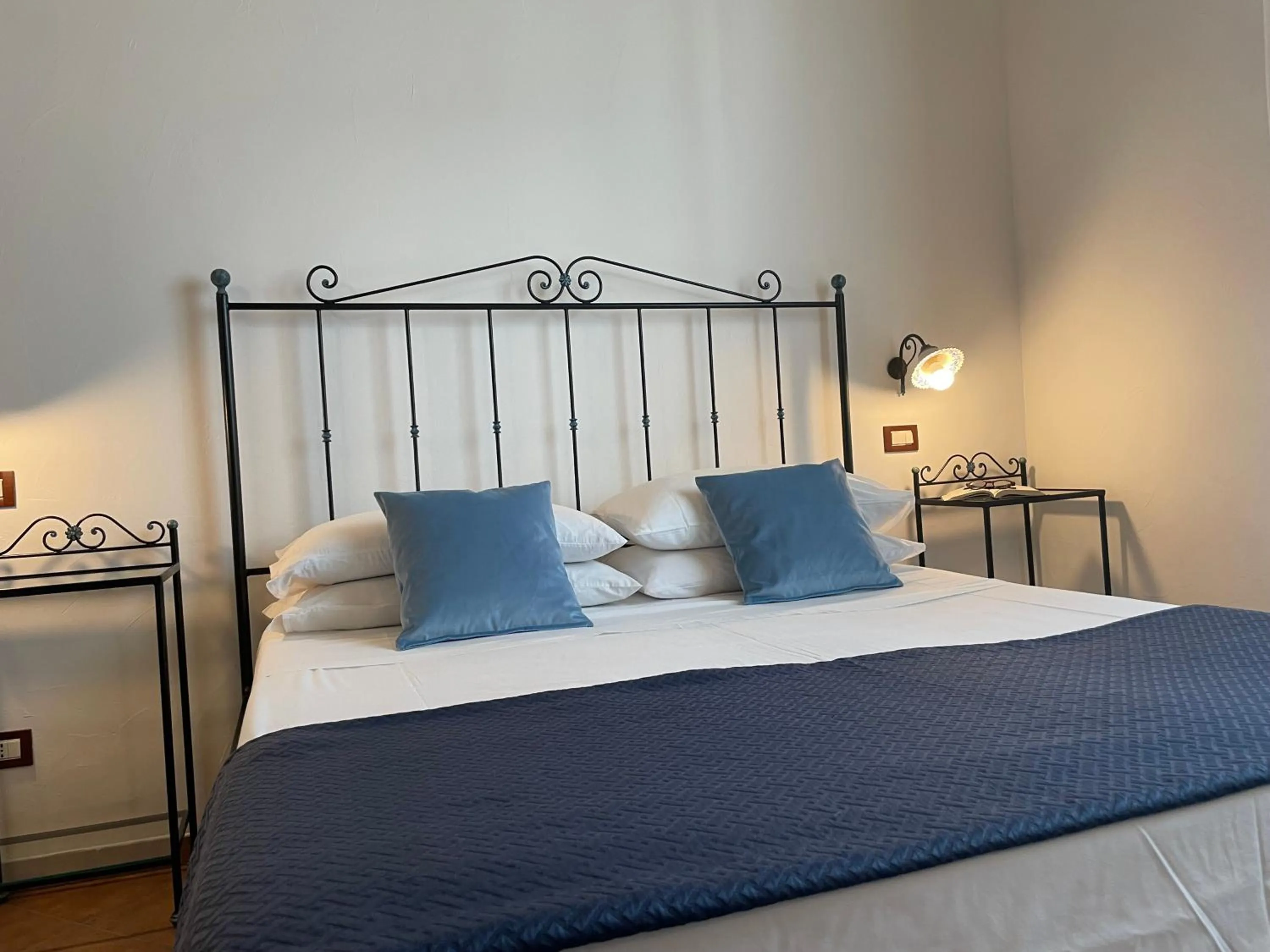 Bed in Ai Dammusi Rooms