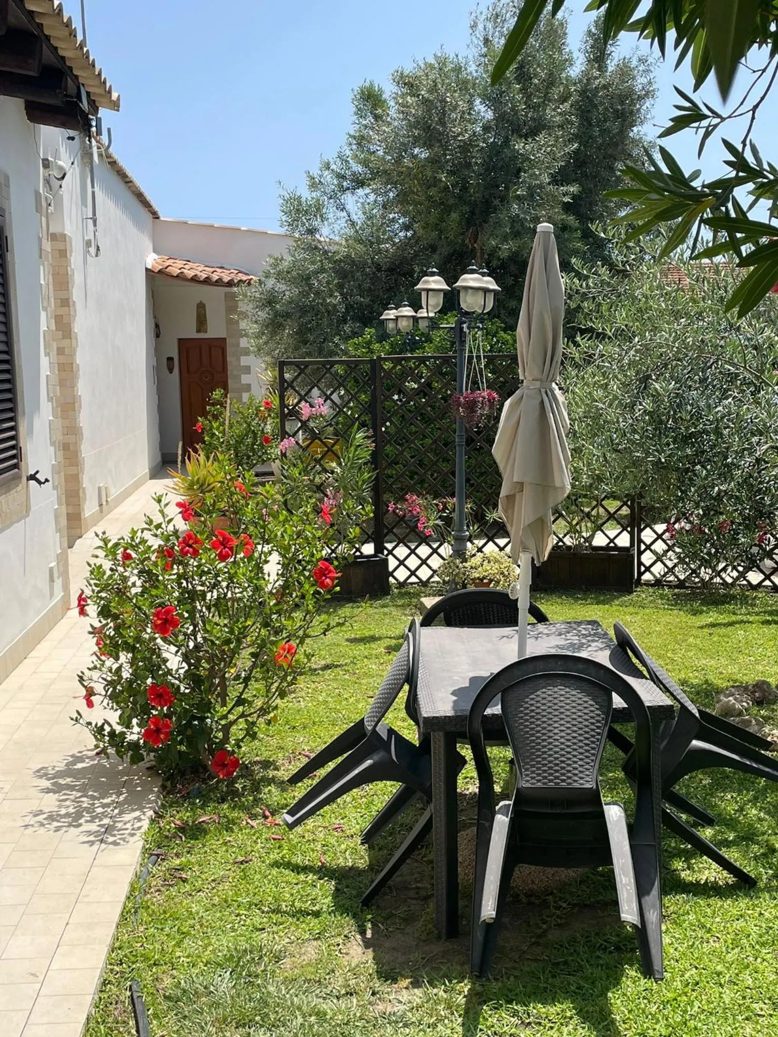 Garden view in Le Case Al Quadrato Residence