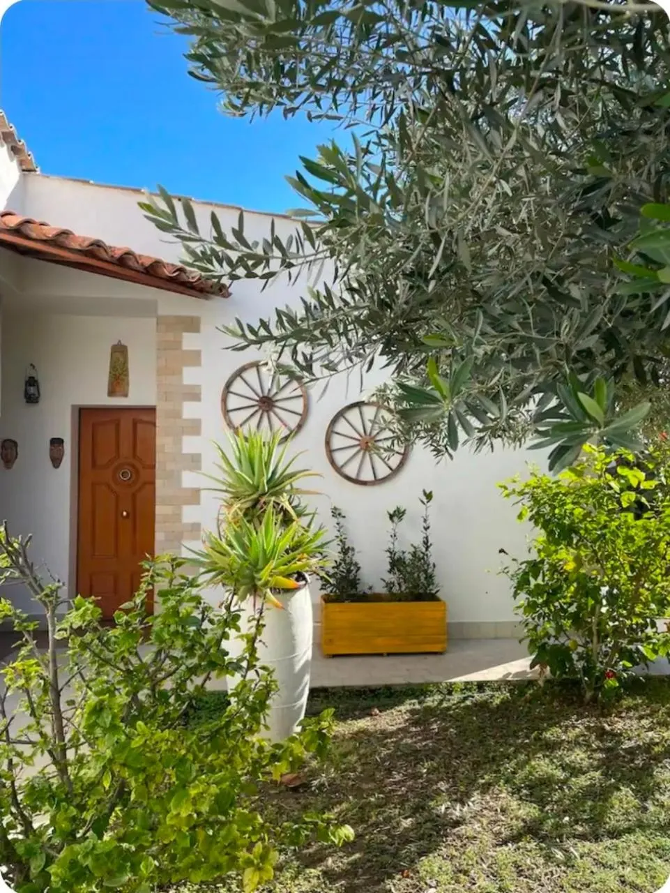 Garden view in Le Case Al Quadrato Residence