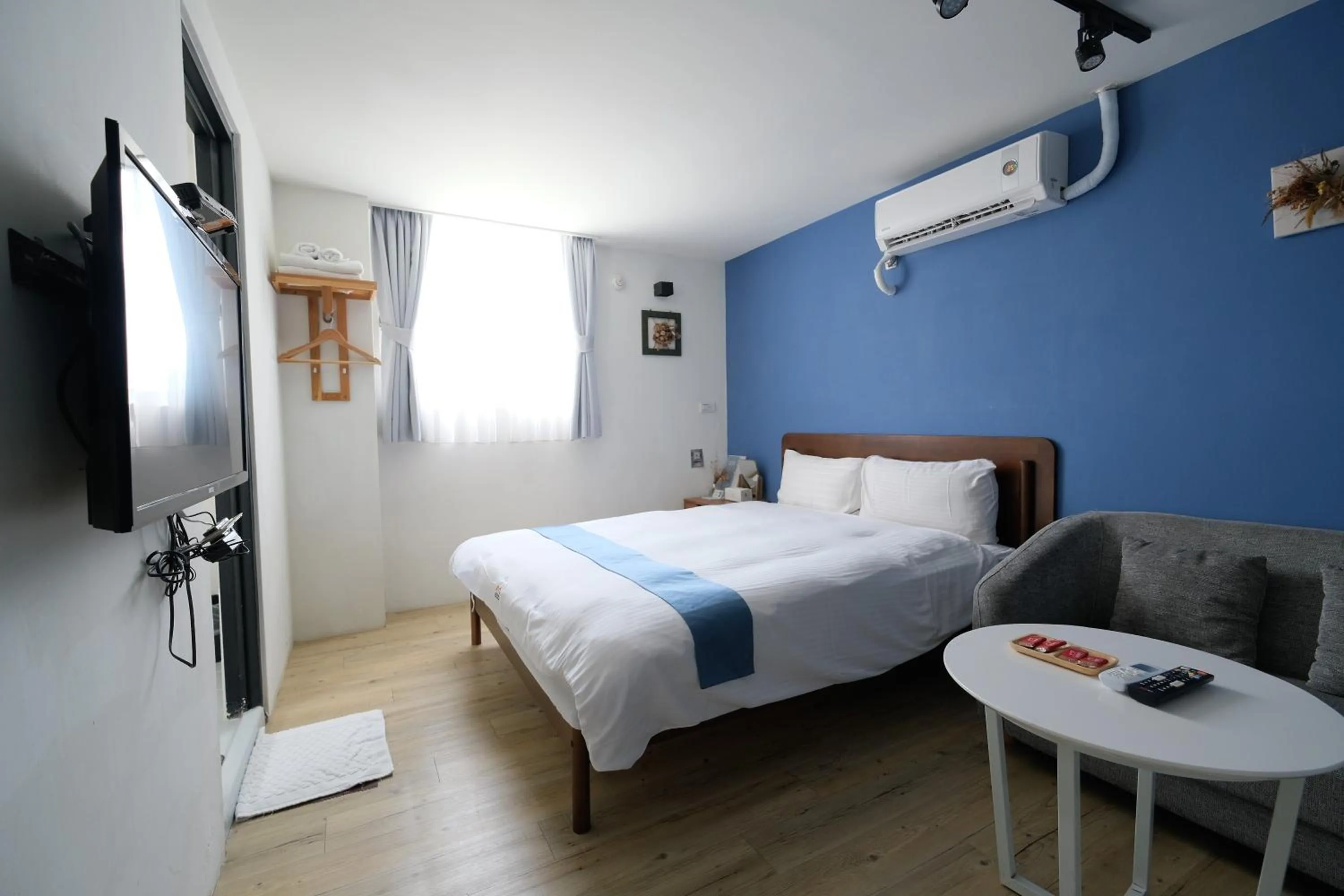 Bed in 沐藍輕旅 Mulan Light Inn I 海安路住宿