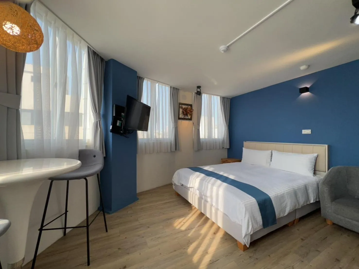 Bed in 沐藍輕旅 Mulan Light Inn I 海安路住宿