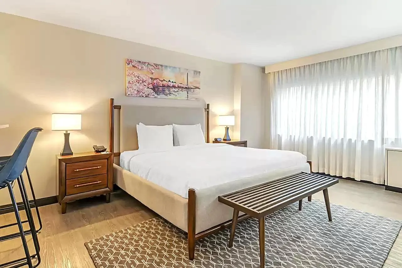 Bed in The Quincy, an Ascend Collection Hotel