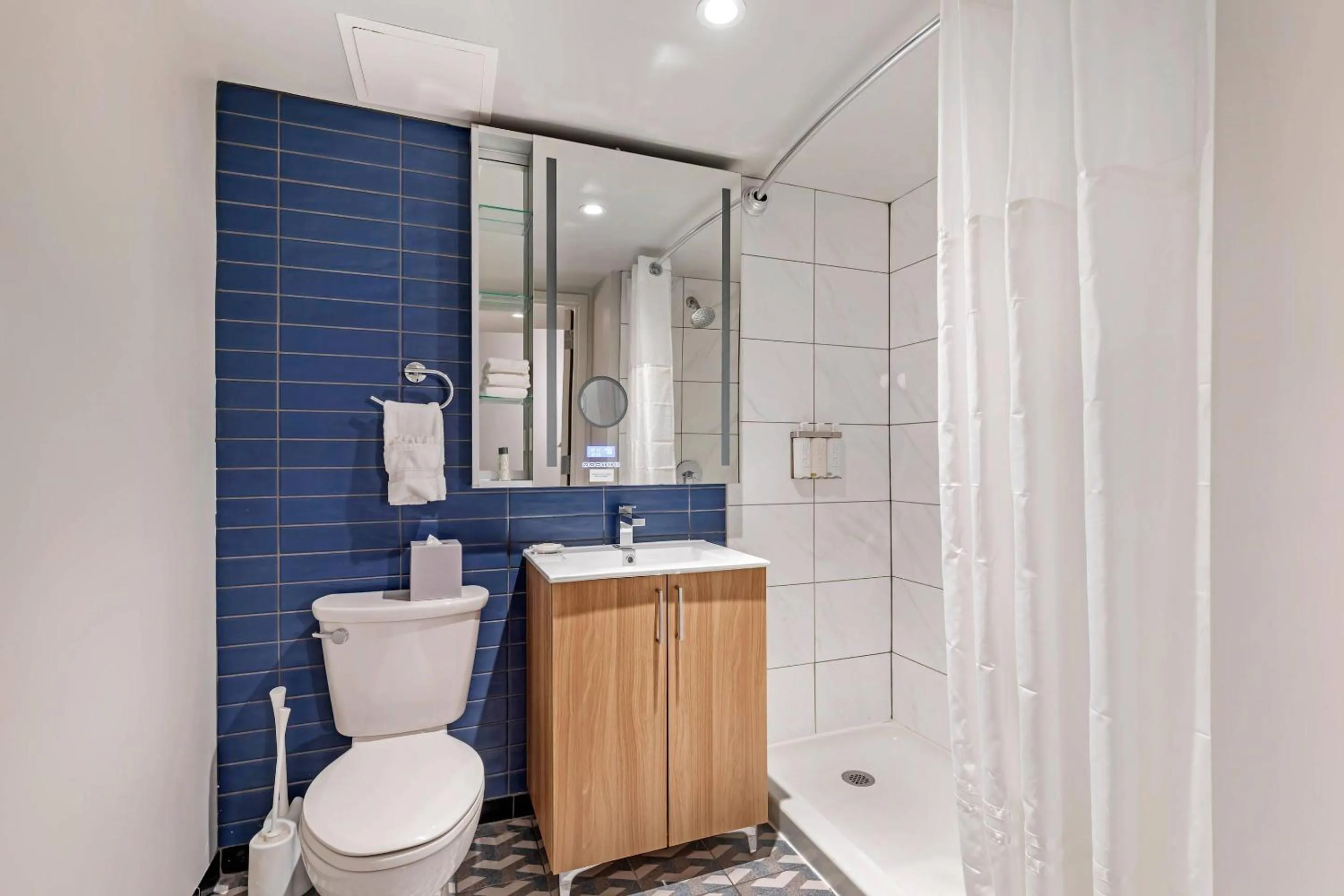 Bedroom in The Quincy, an Ascend Collection Hotel