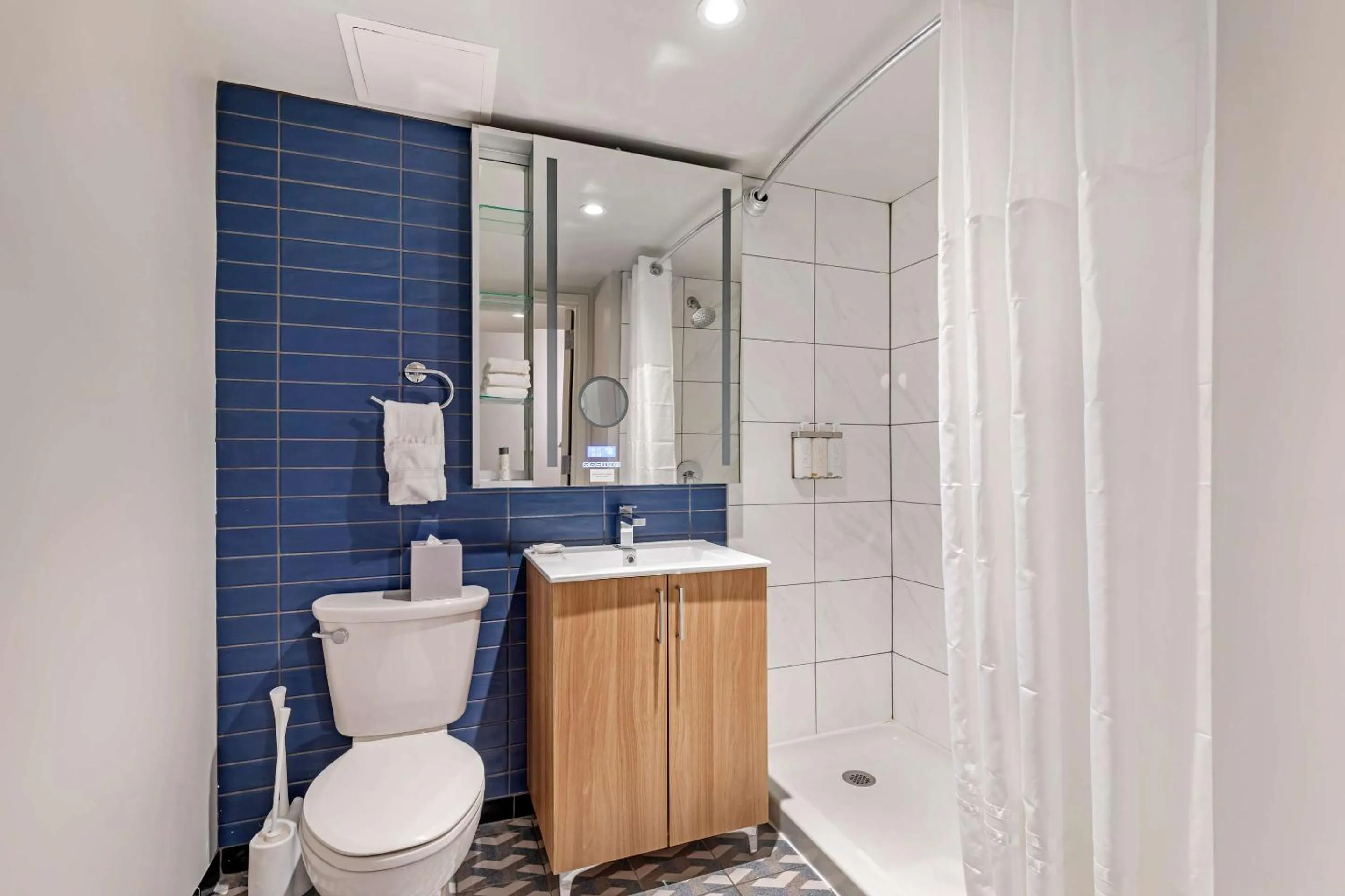 Bedroom in The Quincy, an Ascend Collection Hotel