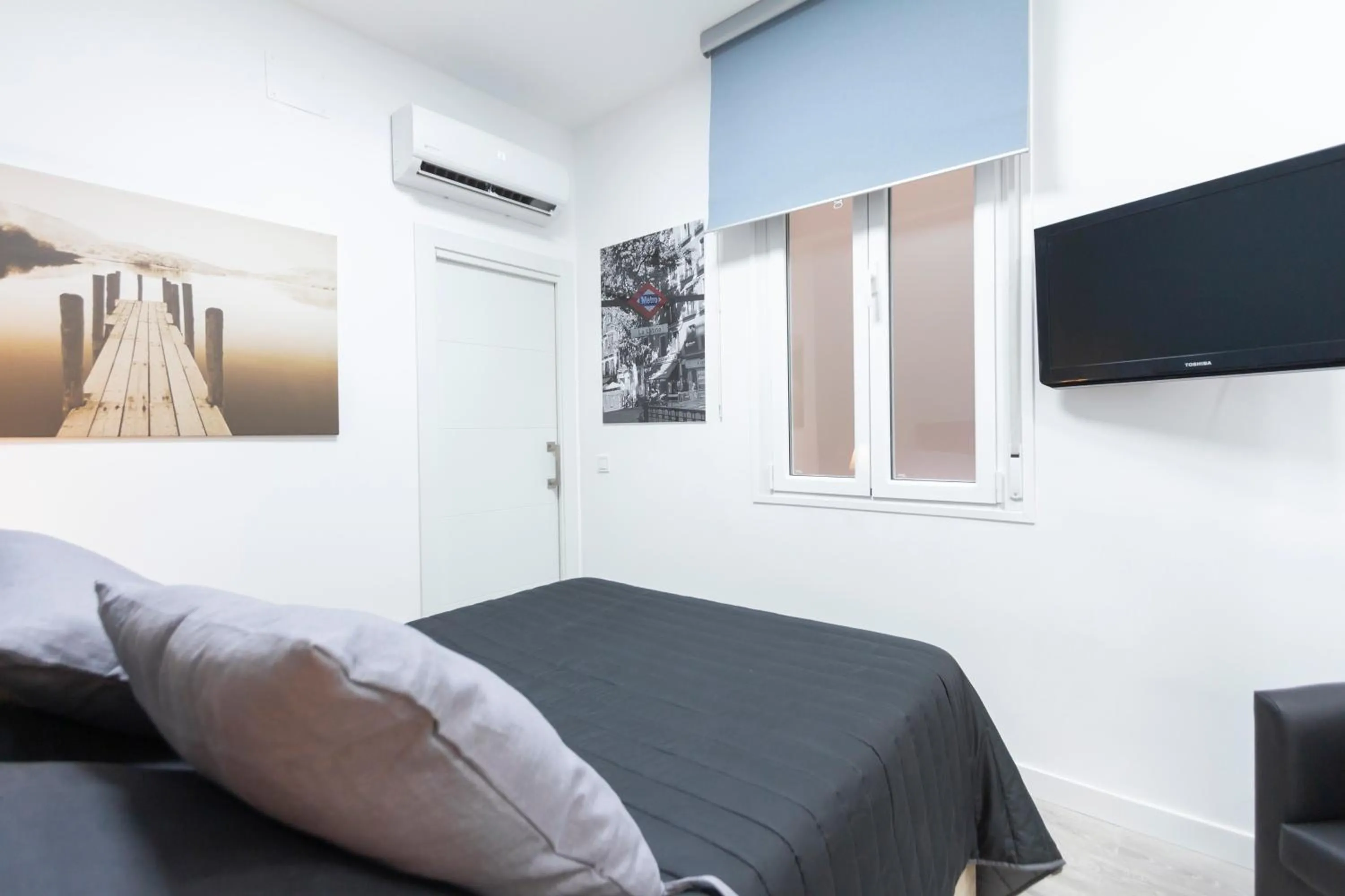 Bed in Plaza Mayor Apartment