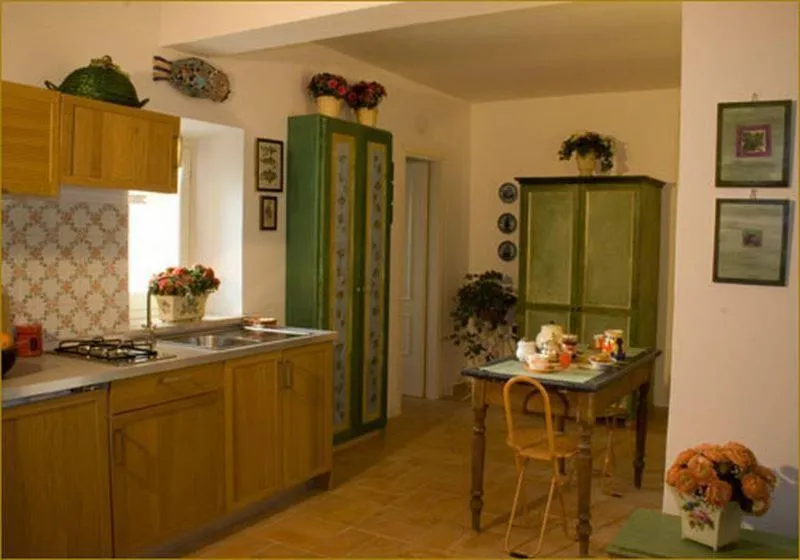 Kitchen or kitchenette in Il Bruco appartamenti in b&b