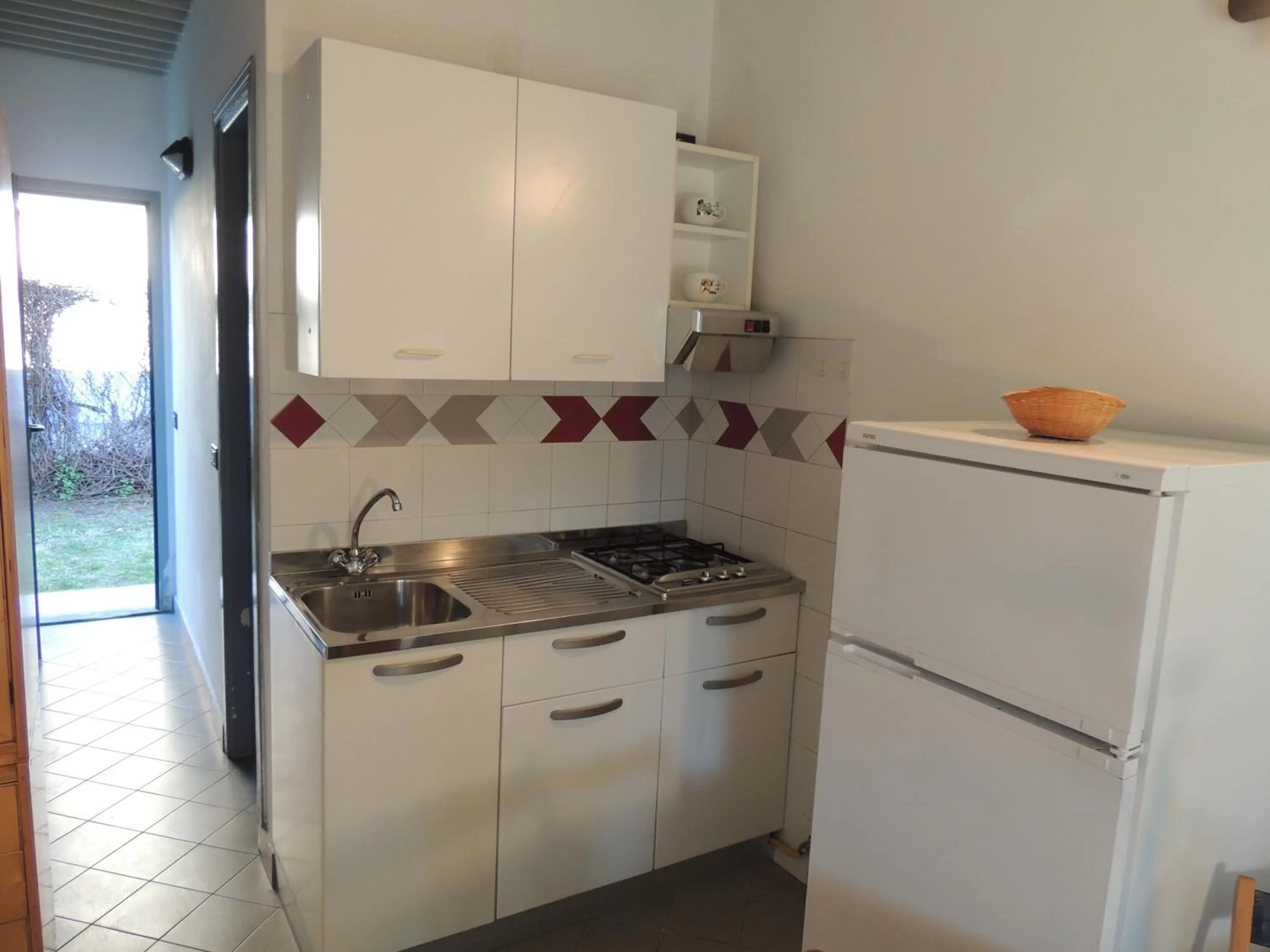 Kitchen or kitchenette in Appartamenti Villaggio Internazionale