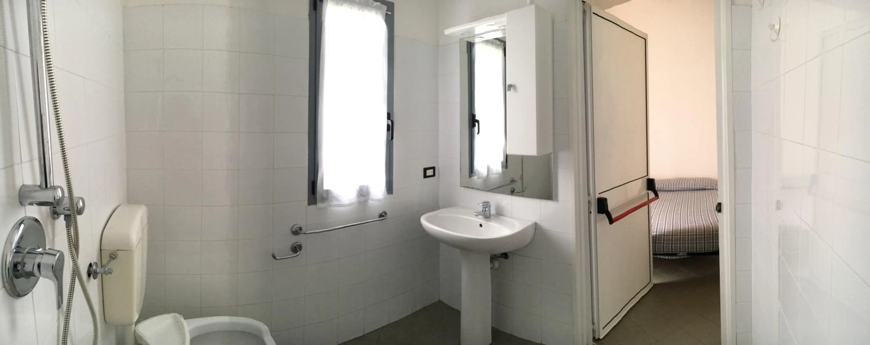 Bathroom, Bed in Appartamenti Villaggio Internazionale