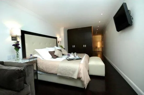 Bed in SUITES LONDRES 212