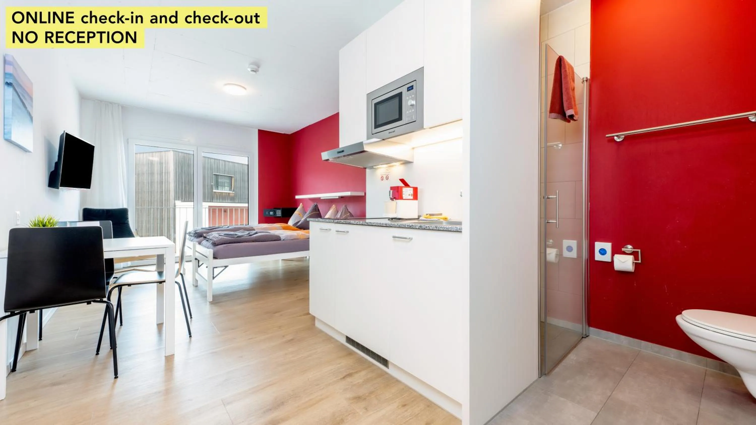 Kitchen or kitchenette in Anstatthotel Horw - app self-check-in