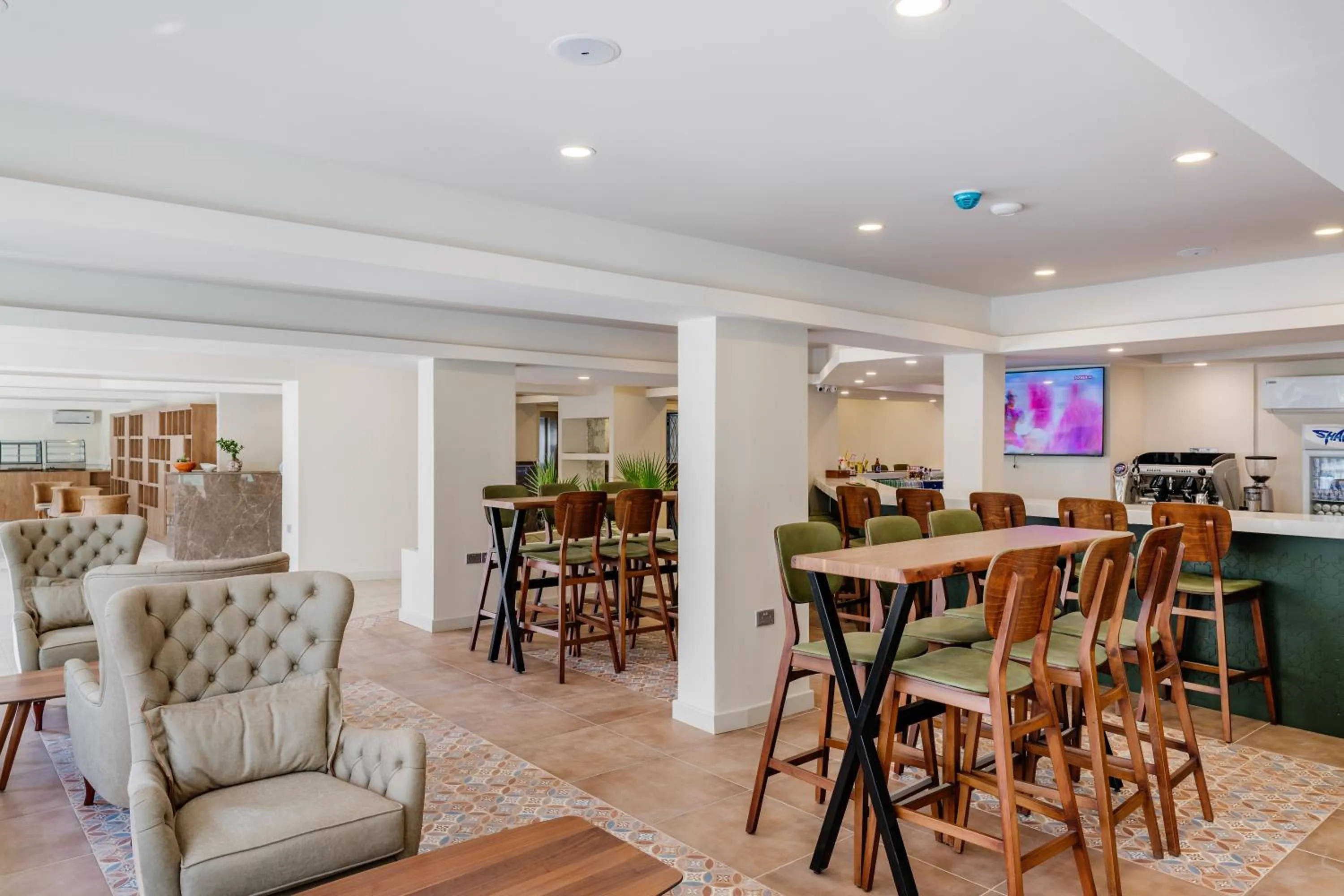 Lounge or bar in Olivia Palm Hotel