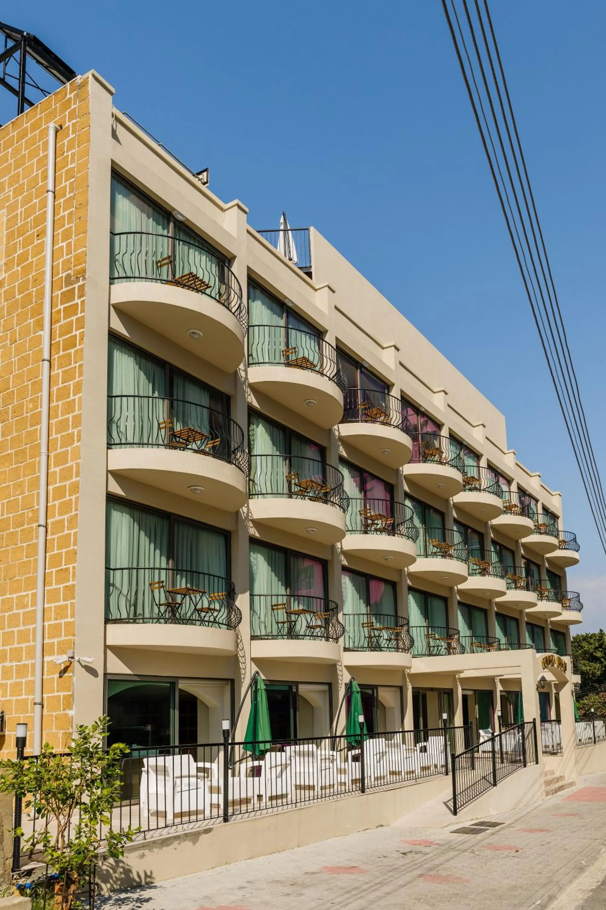 Property building in Olivia Palm Hotel