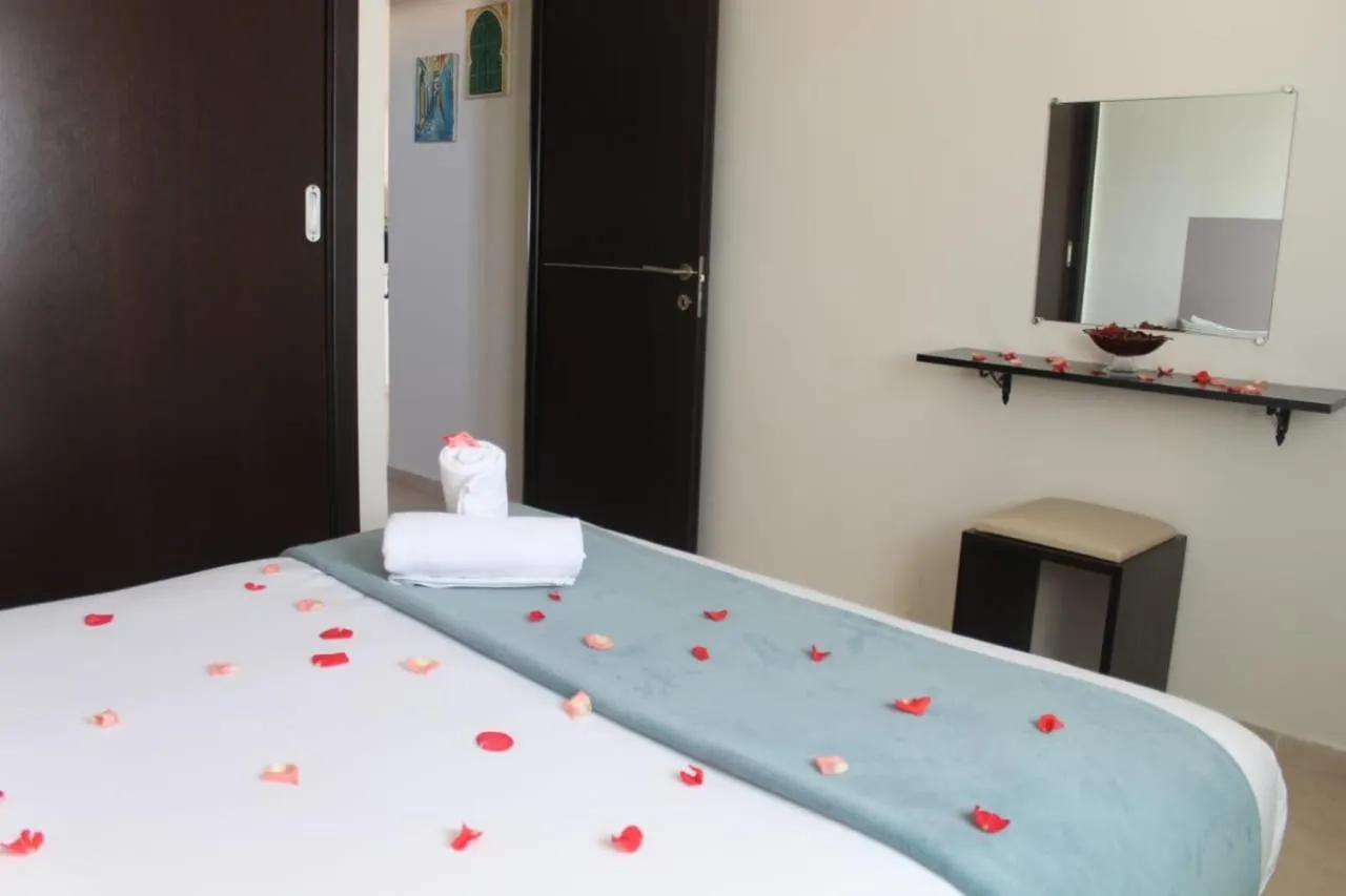 Bed in KENZ MEHDIA Hôtel Ressort