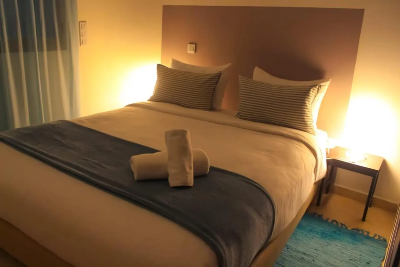 Bed in KENZ MEHDIA Hôtel Ressort