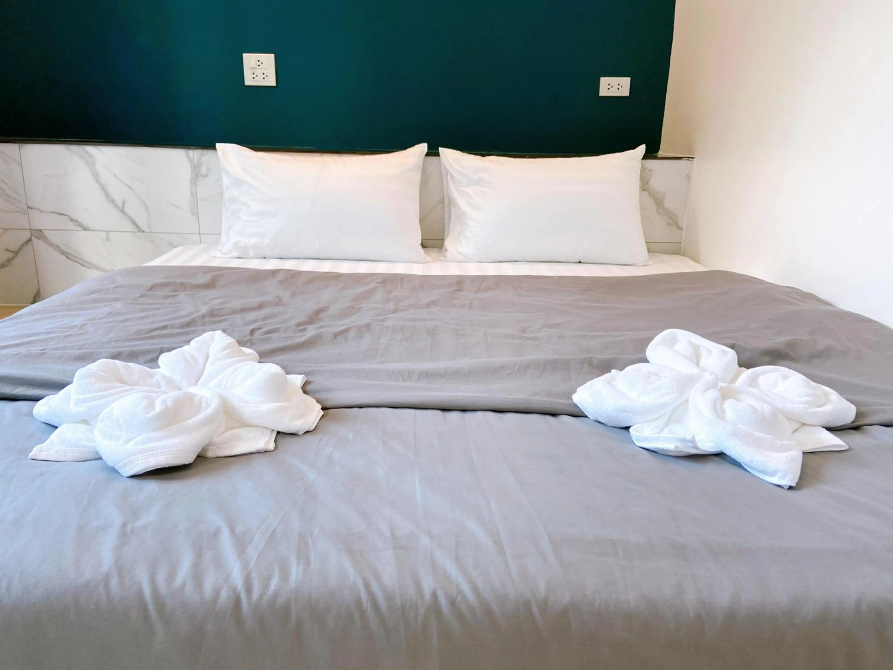 Bed in Petchngam Home Resort