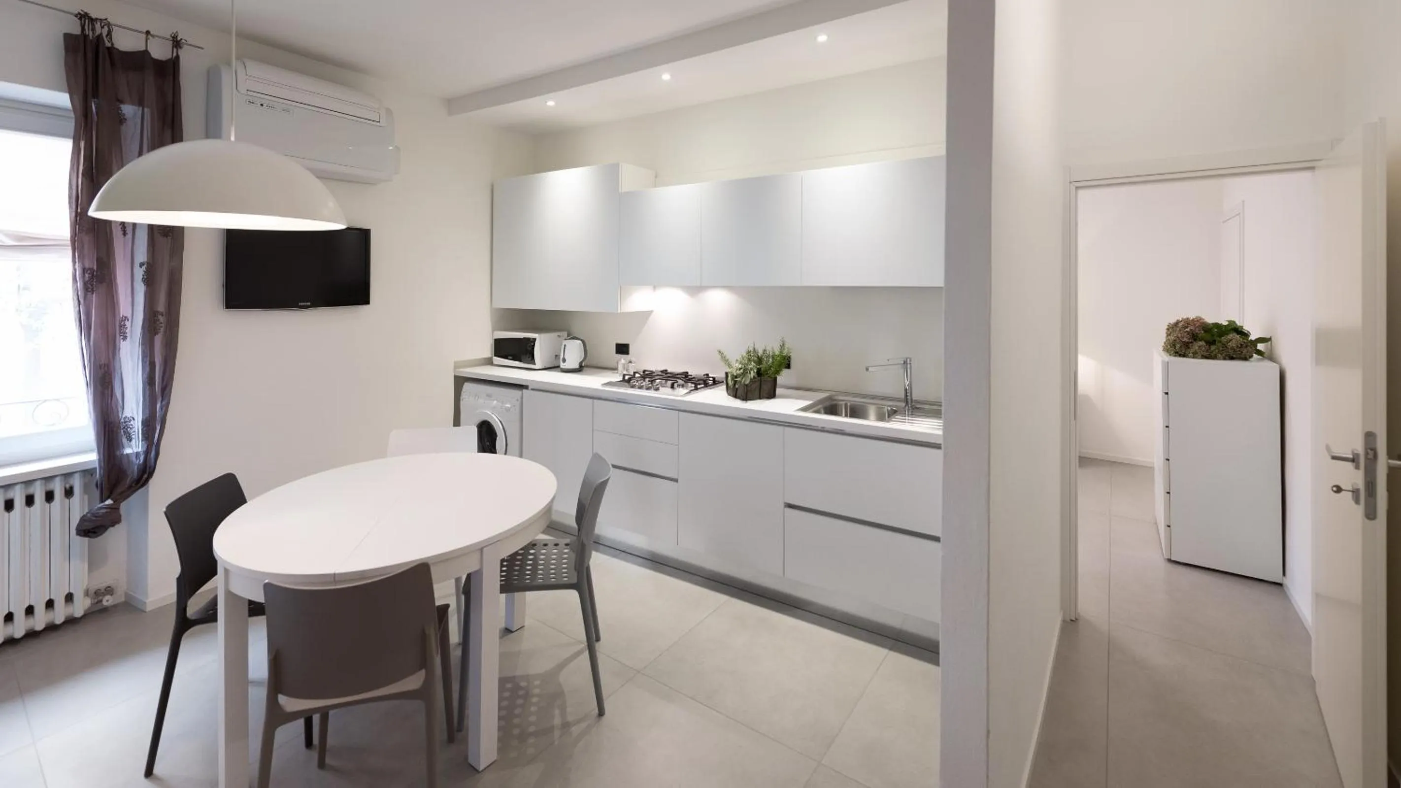 Kitchen or kitchenette in Il Vicolo Aparthotel Verona