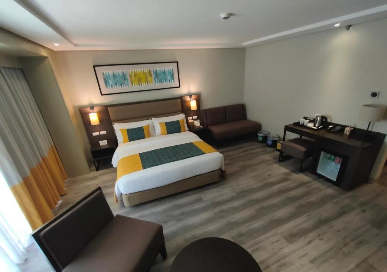 Bed in Belmont Hotel Boracay near Newcoast Beach