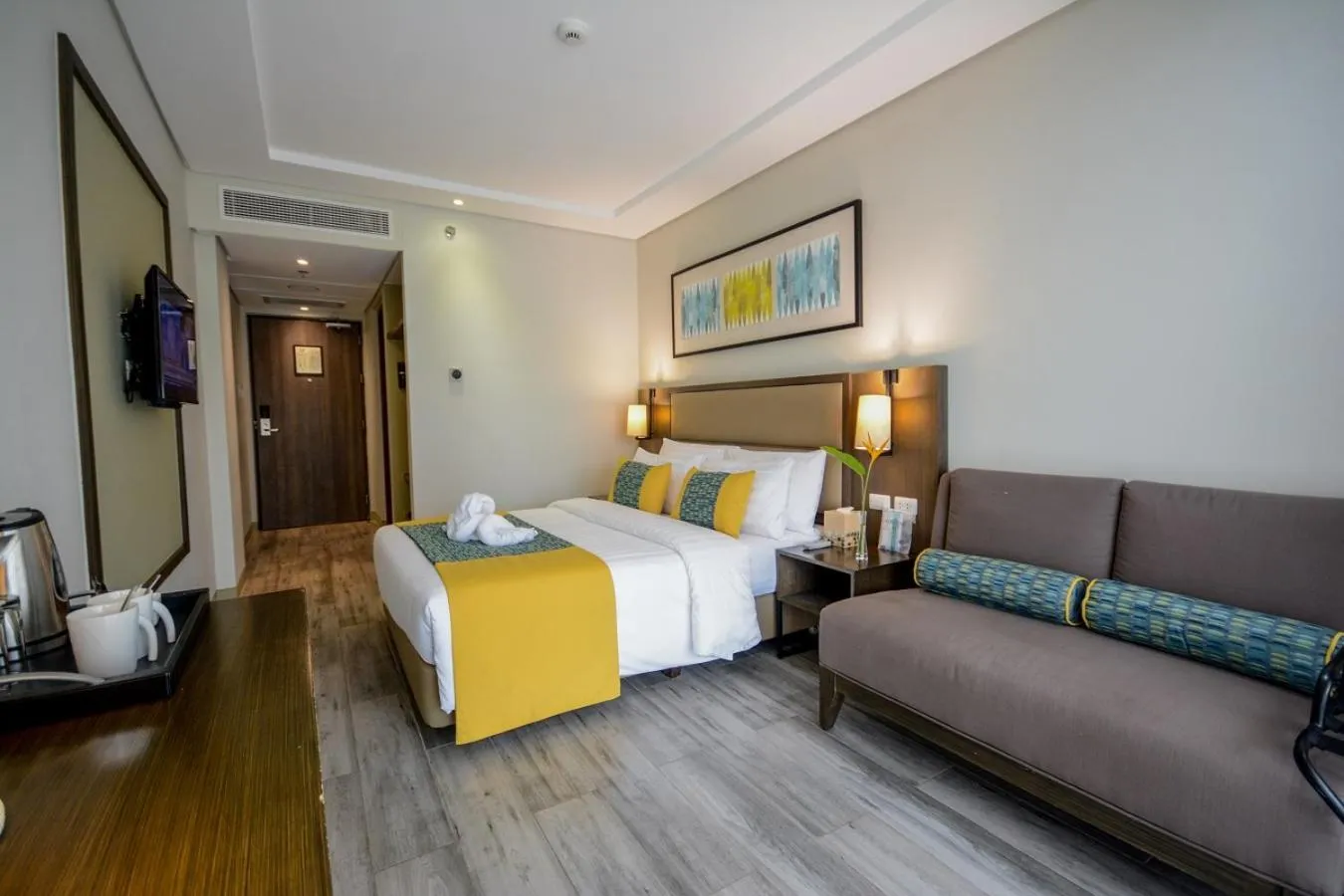 Photo of the whole room, Bed in Belmont Hotel Boracay near Newcoast Beach