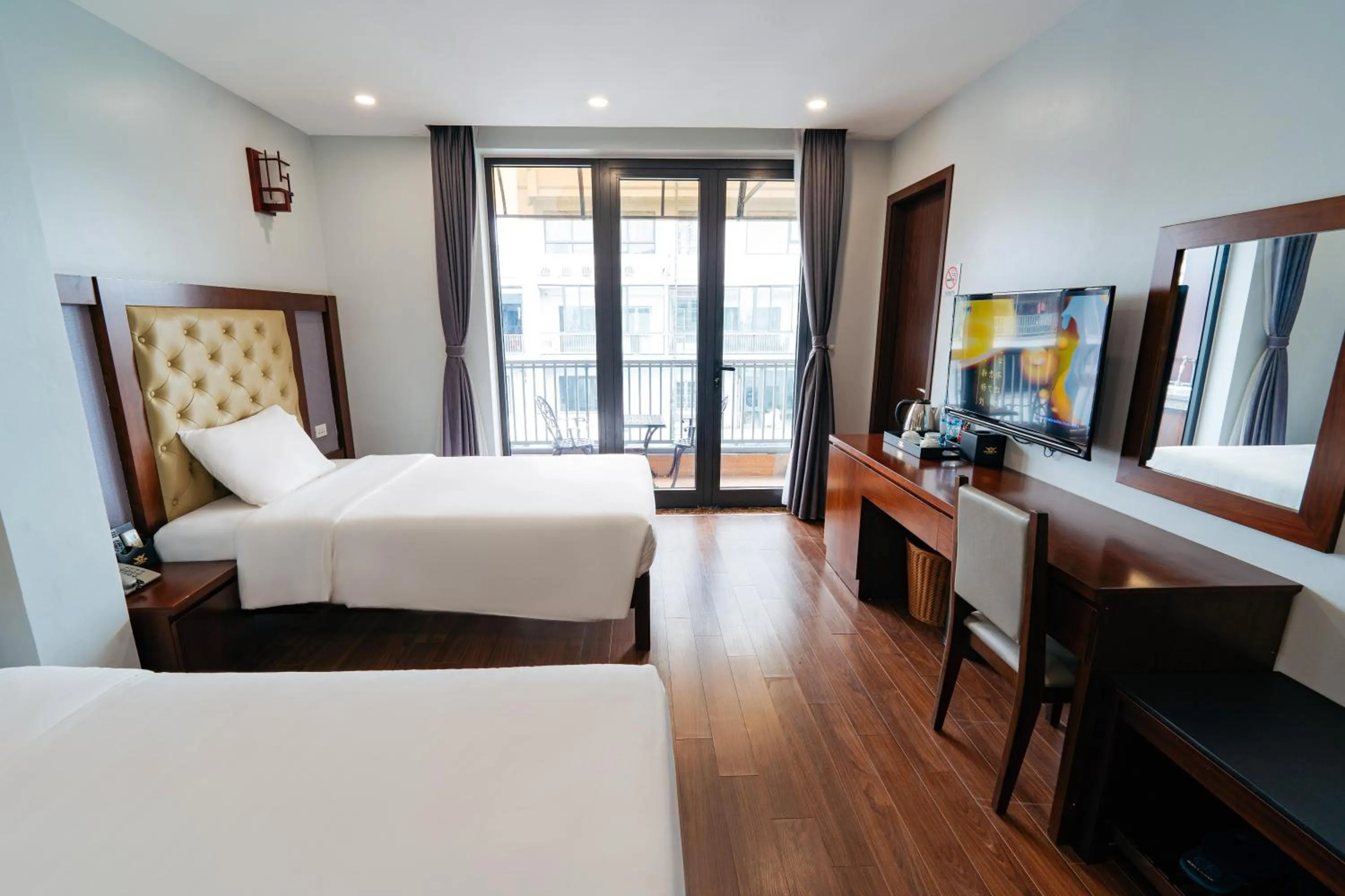 TV and multimedia, Bed in Topone Halong Hotel