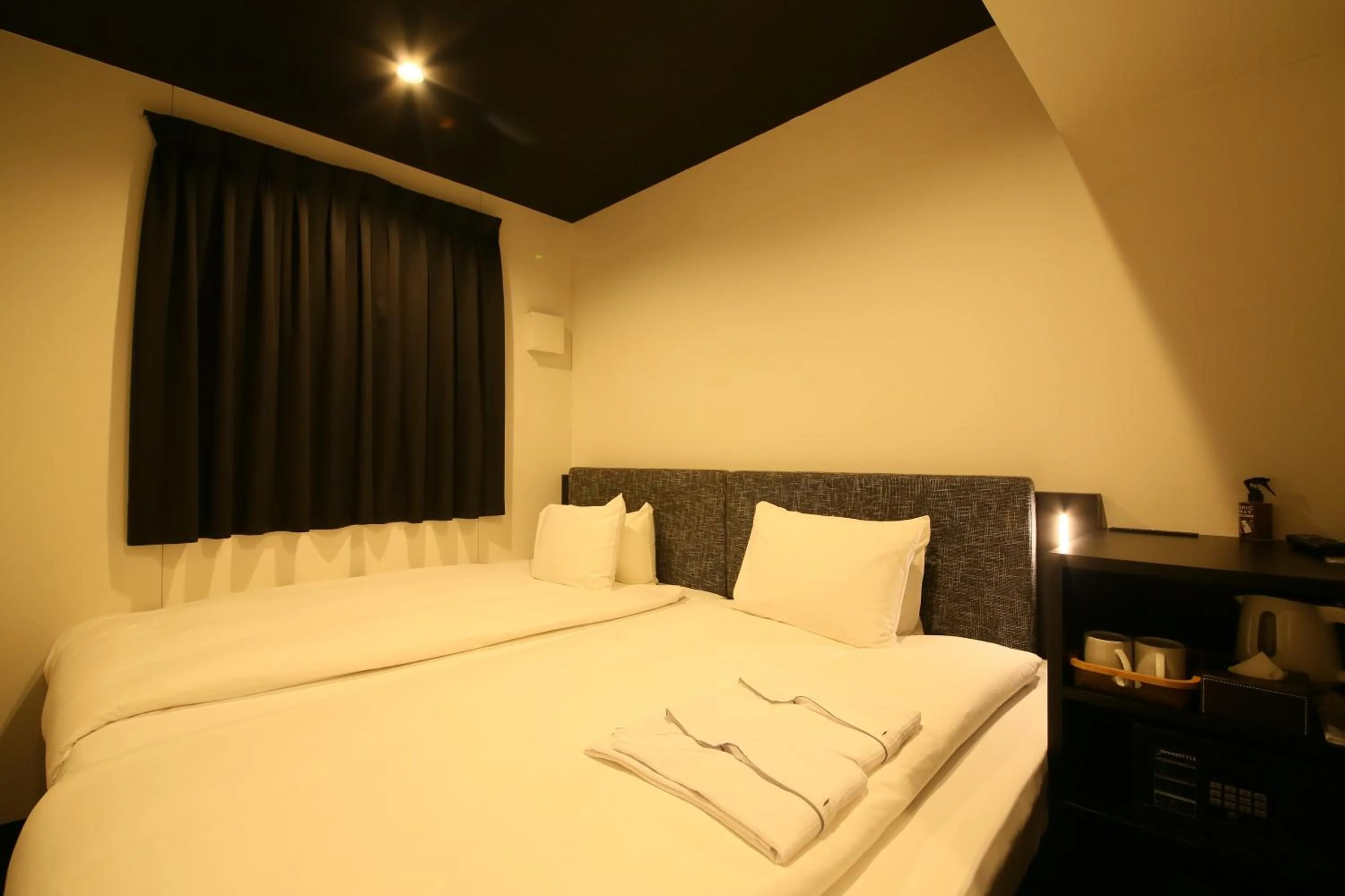 Bed in HOTEL TRAD Replay